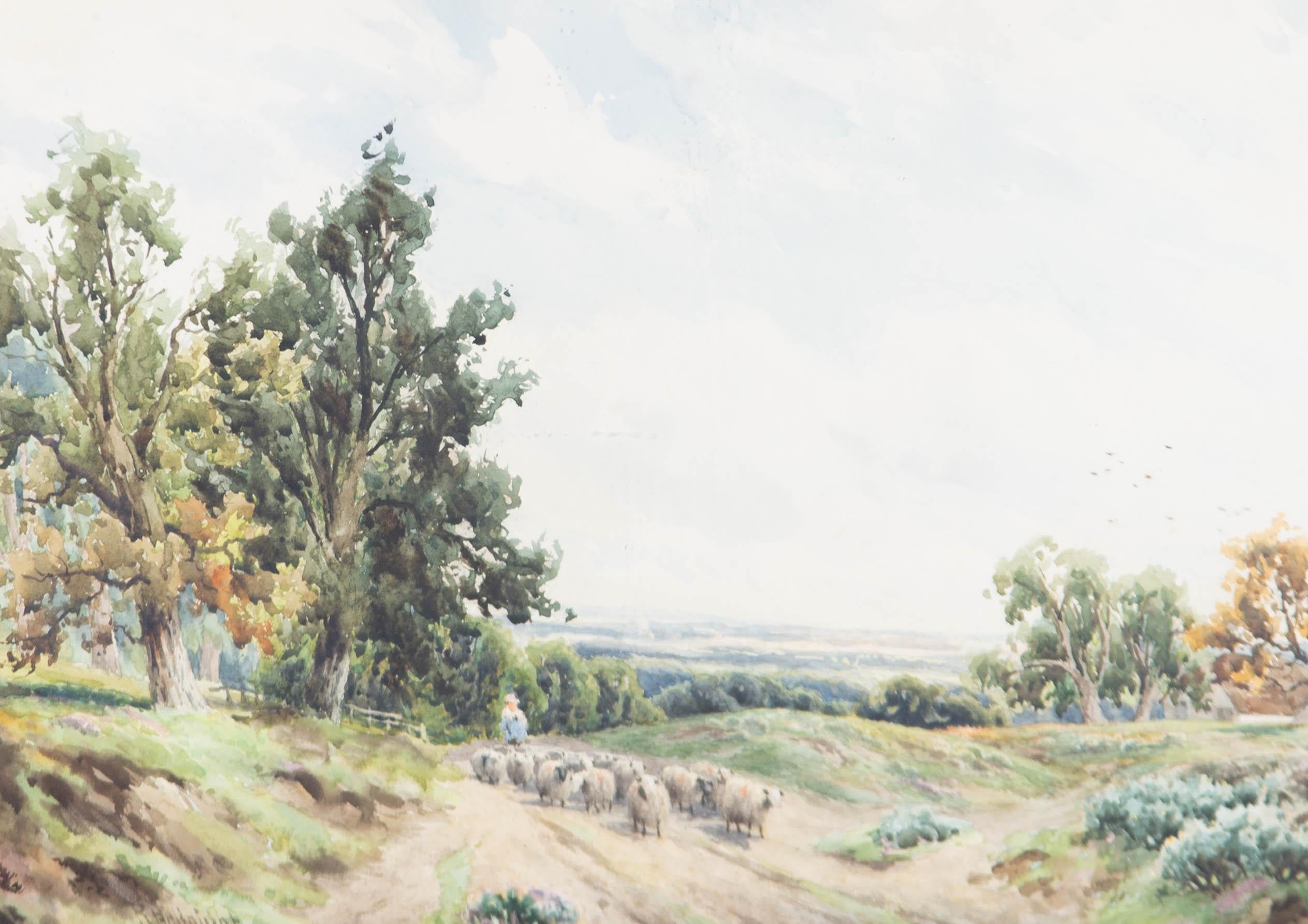 A charming and captivating watercolour painting, depicting a landscape view with a shepherd rearing his sheep in Ludshott Common, near Midhurst. Signed to the lower left-hand corner. Well-presented in a dark green card mount and in a distressed gilt