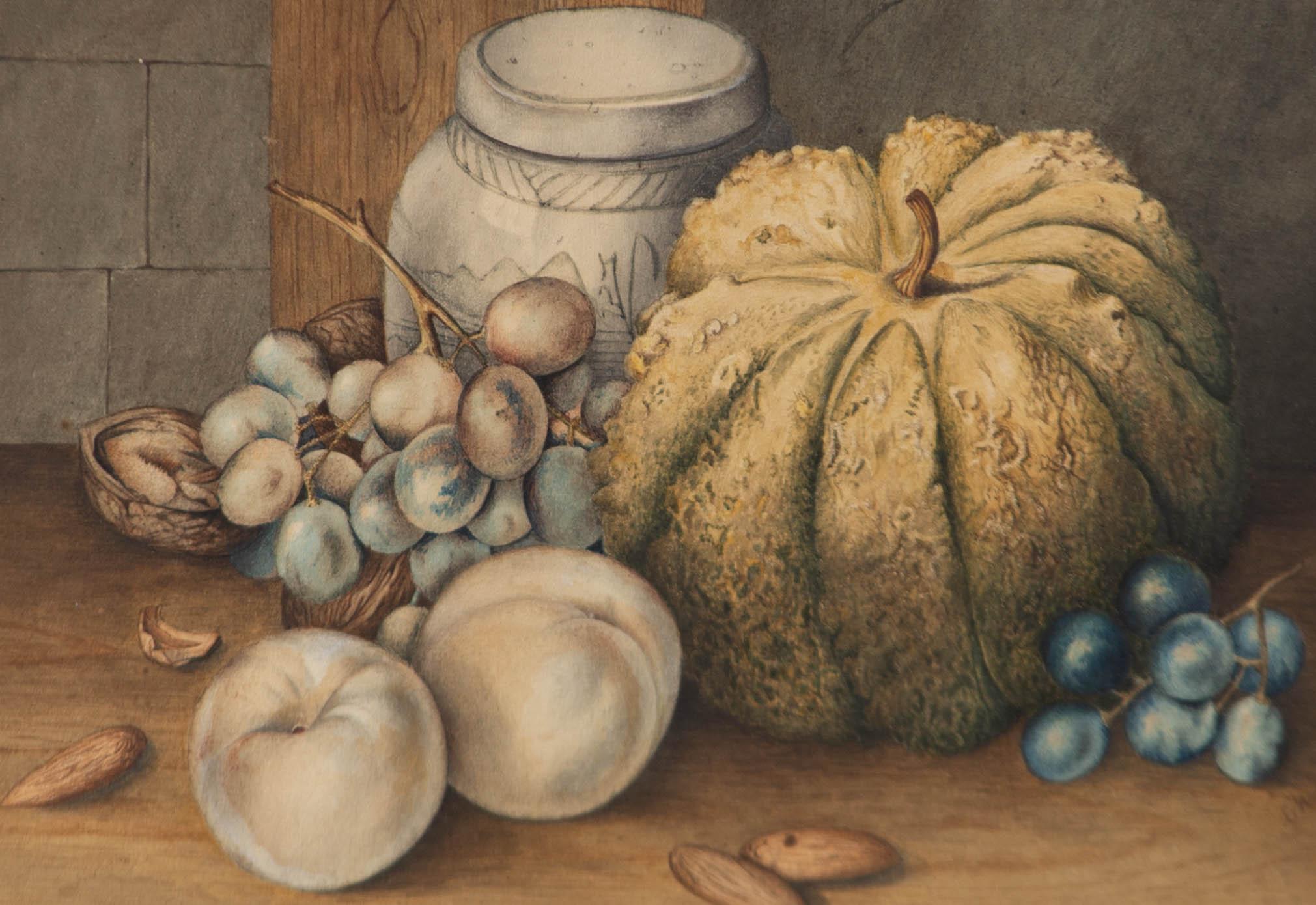 A fine and detailed watercolour painting, depicting a still life composition with several fruits, nuts, a pumpkin and a white jar. Monogrammed to the lower right-hand corner. Well-presented in a double card mount and in an ornate gilt effect frame.