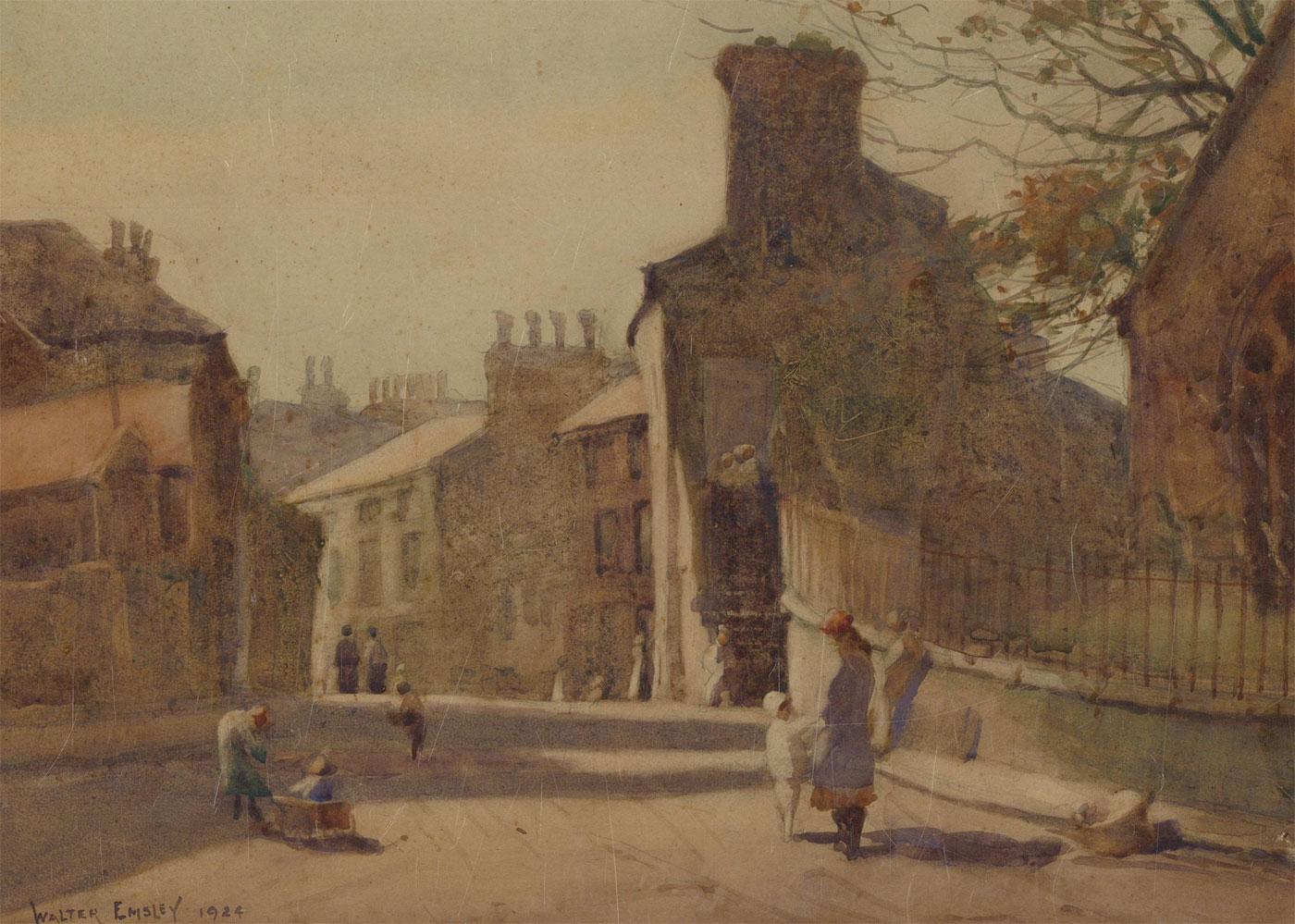 A very fine watercolour study by the listed British artist Walter Emsley (1860-1938). The artist has captured children playing in a street of terraced houses with a small church on the corner. A young girl pulls her young sibling in a wooden cart