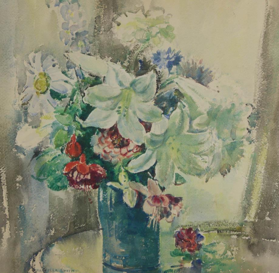 A very fine still life study of a vase of summer flowers by the artist ;Marcella Smith. Wonderfully presented in a washline mount and vintage effect frame. Lanham Art Gallery, St. Ives label to the reverse. Signed. On watercolour paper.
