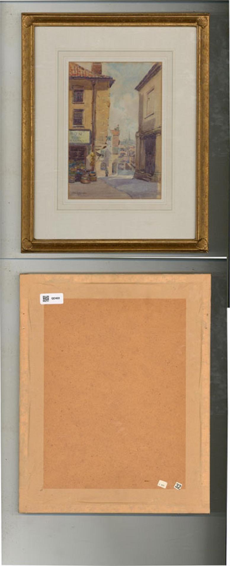 A charming watercolour painting by George H. Martin, depicting a street scene with a shop and two figures in the distance. Signed and dated to the lower left-hand corner. Well-presented in a wash line card mount and in a distressed gilt effect frame