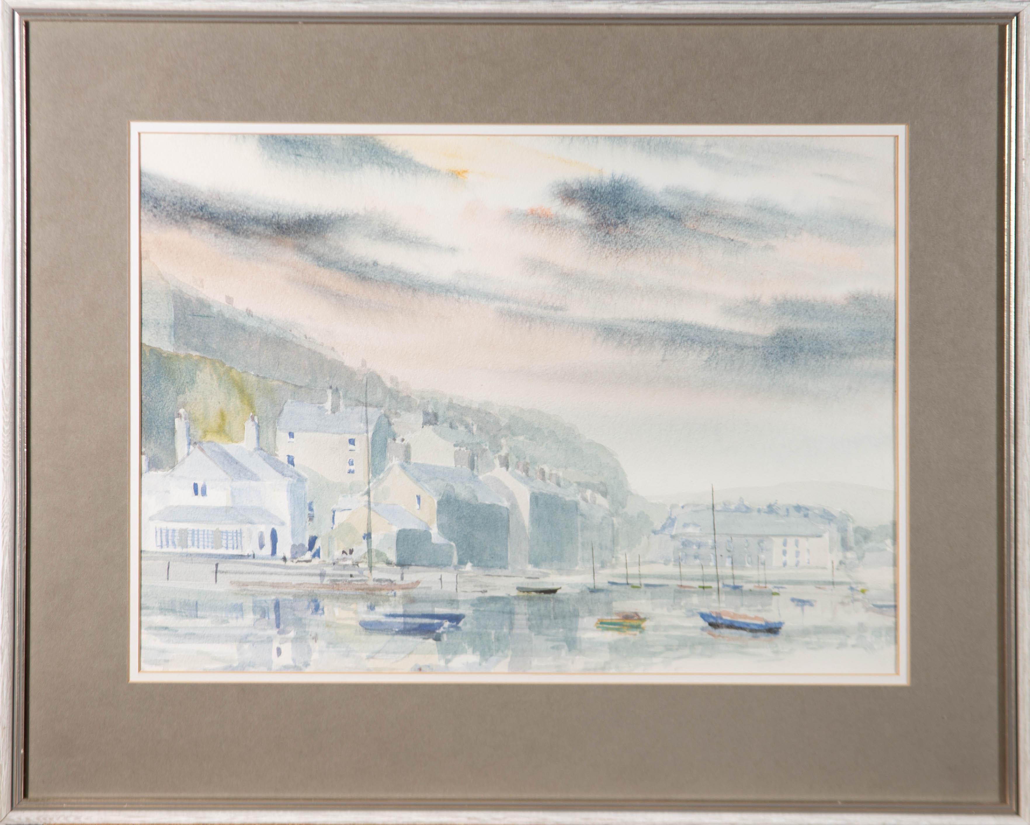 A captivating watercolour painting by J.K. Roberts, depicting a scene at Porthmadog Harbour, a Welsh coastal town and community in the Eifionydd area of Gwynedd. Signed and dated 'blind' to the lower right-hand corner. Location inscribed 'blind' to