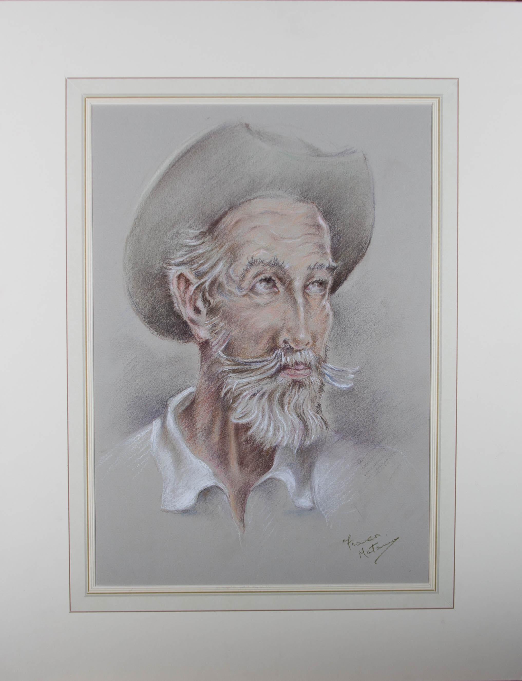 A charming chalk drawing by the artist Franco Matania, depicting an old man in a hat. Signed to the lower right-hand corner. Well-presented in a wash line card mount. On wove.
