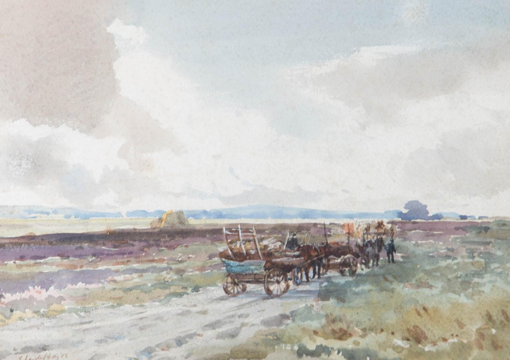 An atmospheric, rural landscape under a grey, overcast sky. A group of carts pulled by horses process long the dirt track. The artist has signed to the lower left corner. The painting is presented in a hand carved, wooden, gilt effect frame with