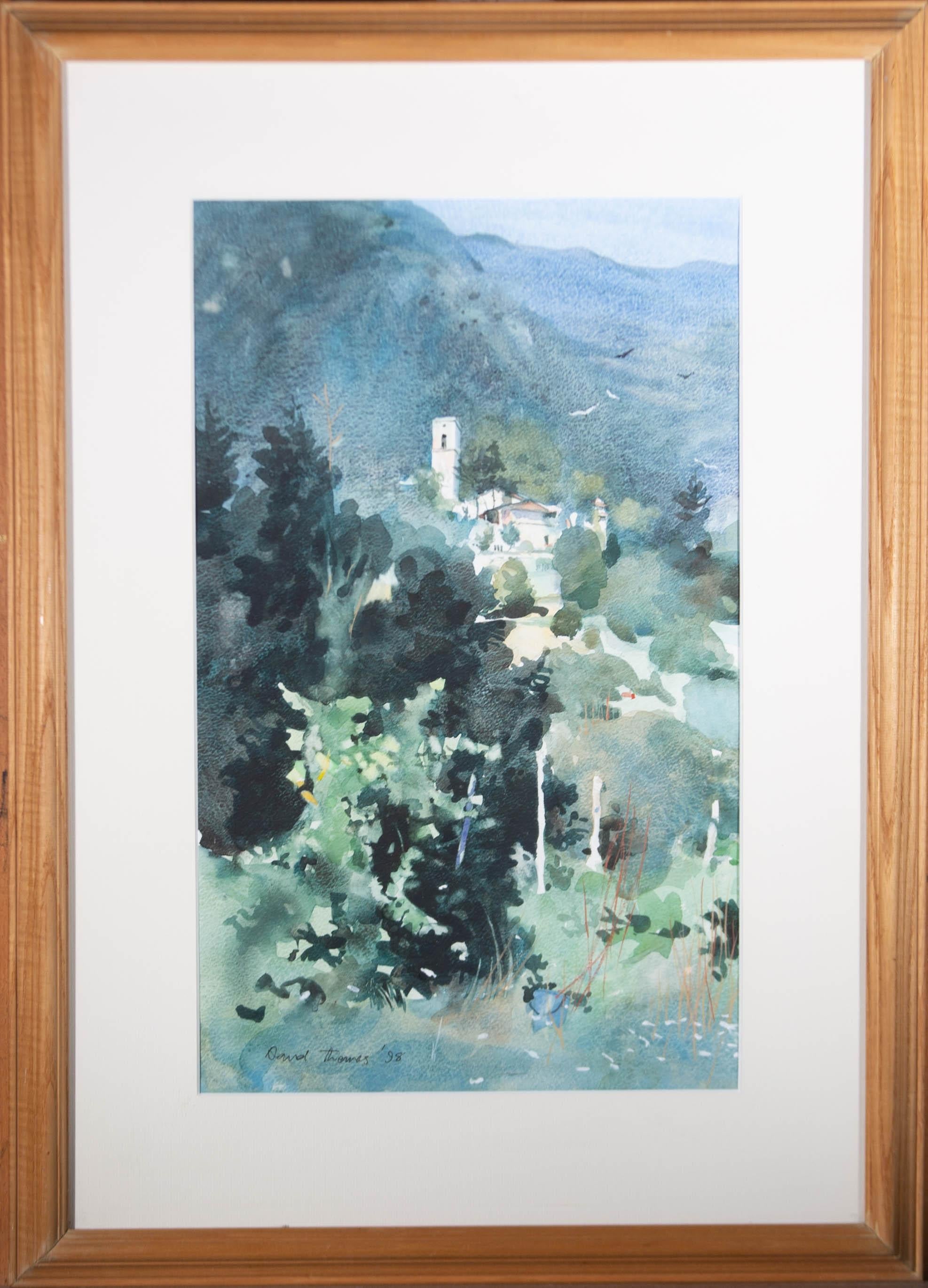 A continental landscape in watercolour showing a church, hidden away in the greenery of lush hills. The artist has signed and dated to the lower left corner and the painting has been presented in a contemporary pine frame with a cream card mount and