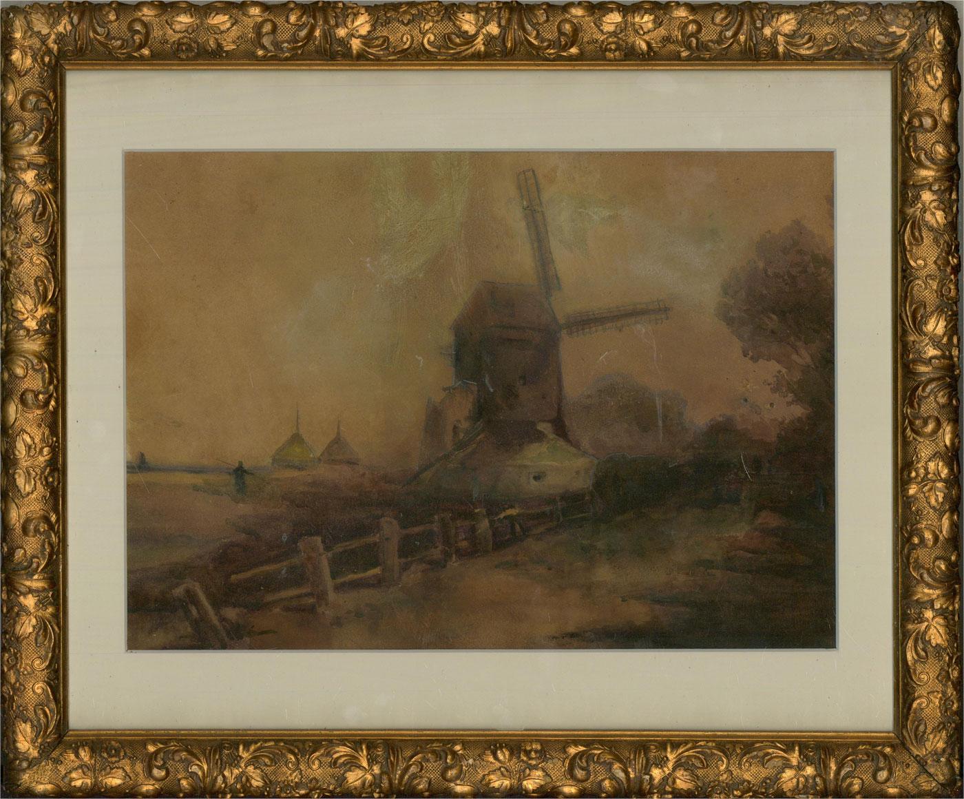 An atmospheric and moody watercolour landscape showing a Standermolen (Dutch windmill) in a darkened, brooding landscape. The painting is unsigned and presented in a handsome early turn of the Century foliate gilt frame boasting scrolling acanthus