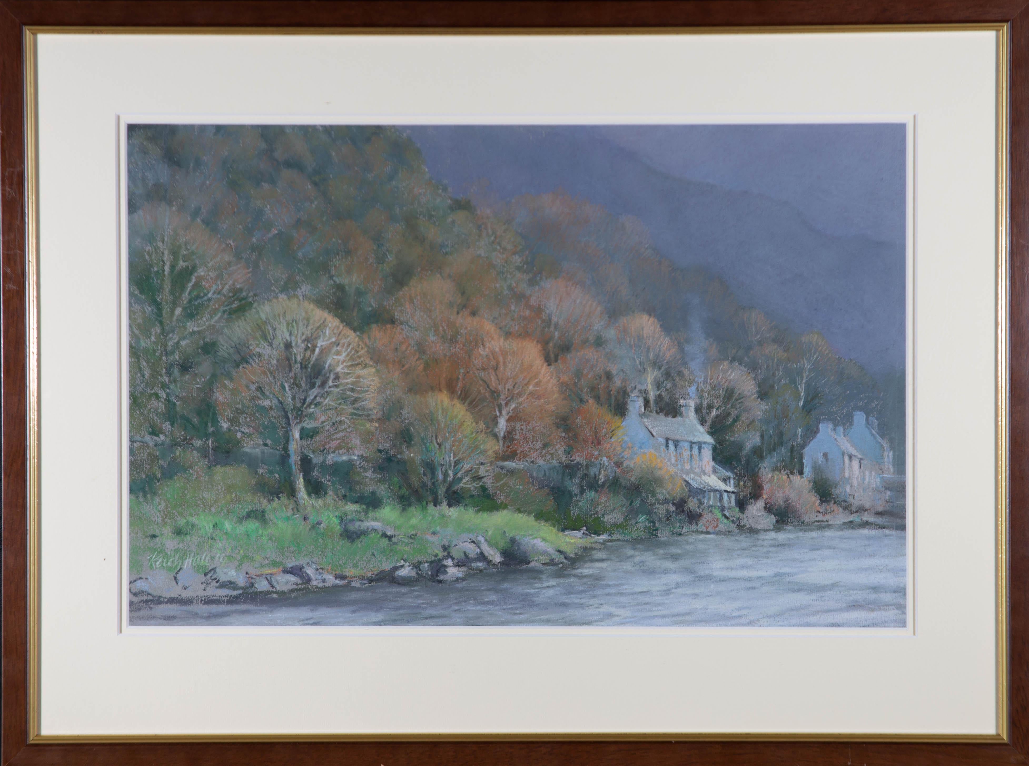 A pastel showing some cottages sat along the riverbank next to the forest. Well presented in a double card mount and simple wood frame with gilt effect trim. Signed and dated in pastel and graphite to the lower right. On wove.
