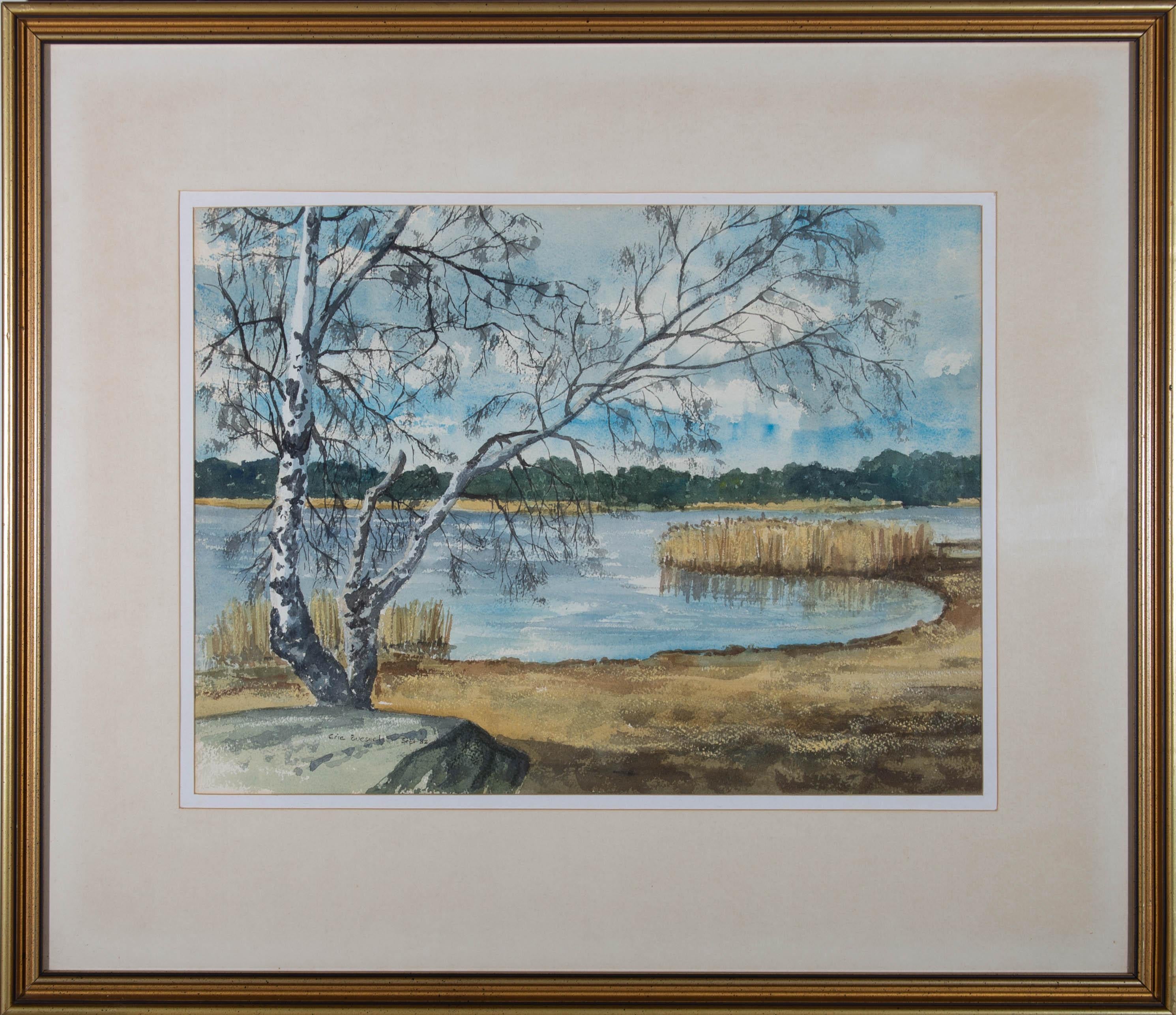 A tranquil scene depicting a birch tree before a lake. Signed and dated to the lower left. On wove.


