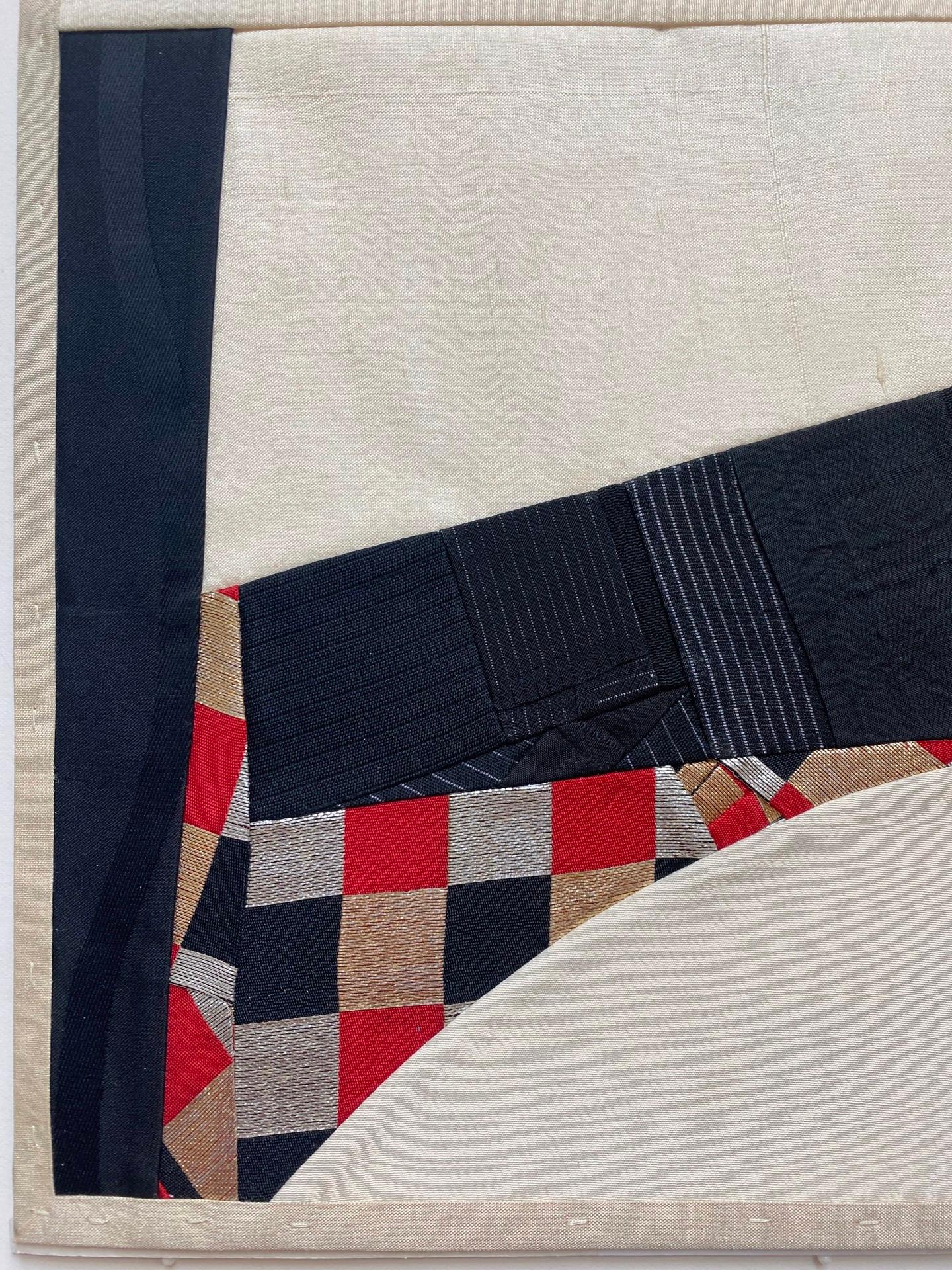 Debra Smith's fabric collages are like snippets of contemporary quilts. She recycles fabrics, such as the silk linings of antique Japanese kimonos used to make much of her current body of work. The silks are different shades of neutral and lend a