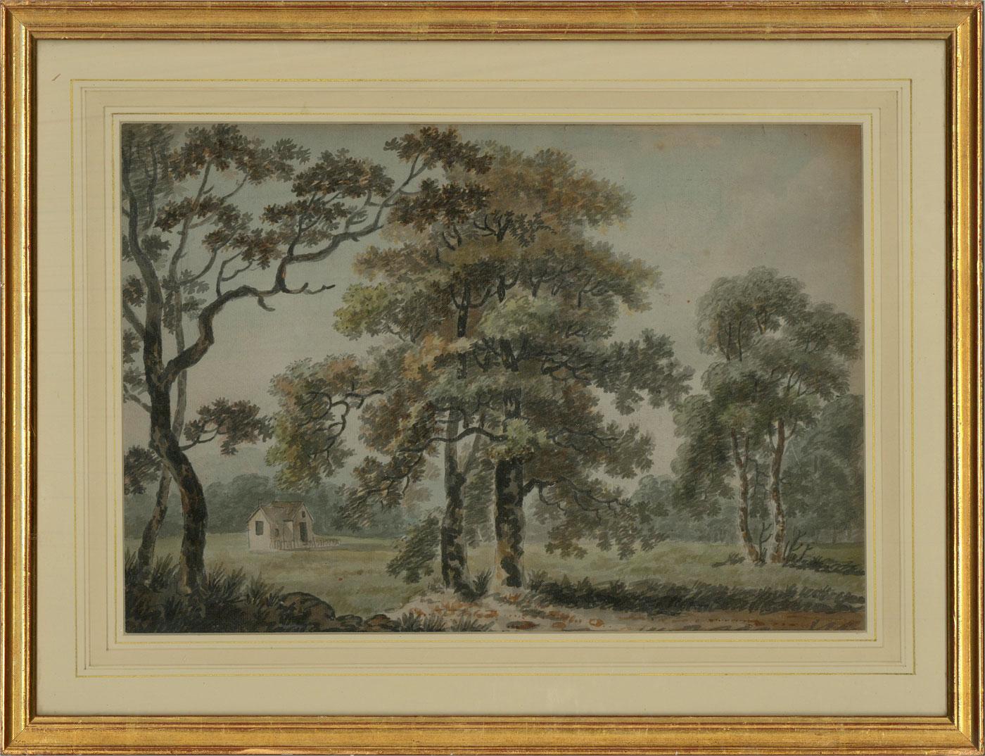 A wonderful English landscape in watercolour showing a small house in the middle of a meadow clearing, surrounded by tall trees. executed by an obvious follower of Paul Sandby, this scene has the delicate style and composition of Sandby's own work