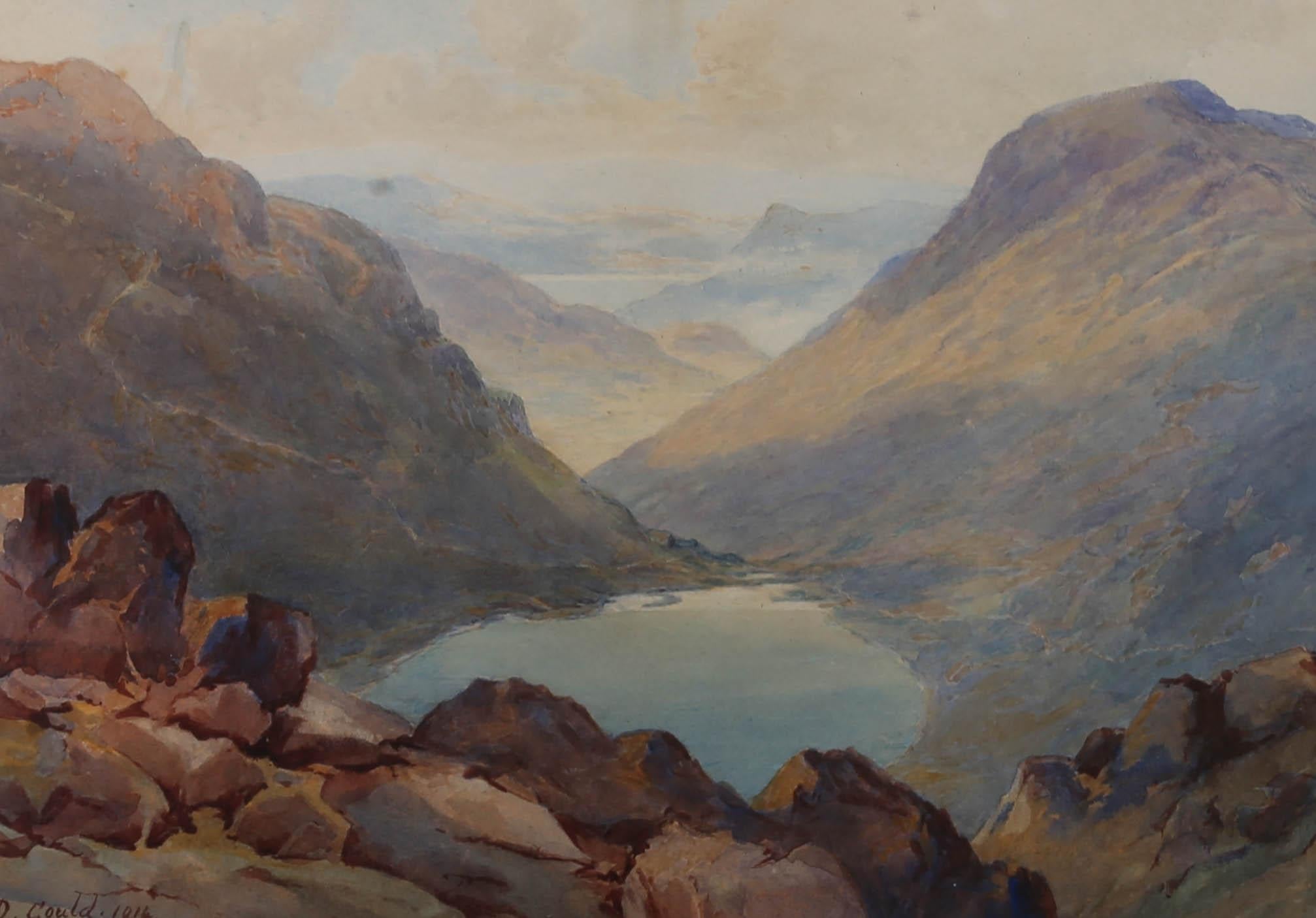 An atmospheric and striking early 20th century watercolour by landscape artist David Gould. This impressive view from Grisedale Pike, Cumbria depicts a secluded water hole enveloped by undulating mountains on either side. This scene is typical of