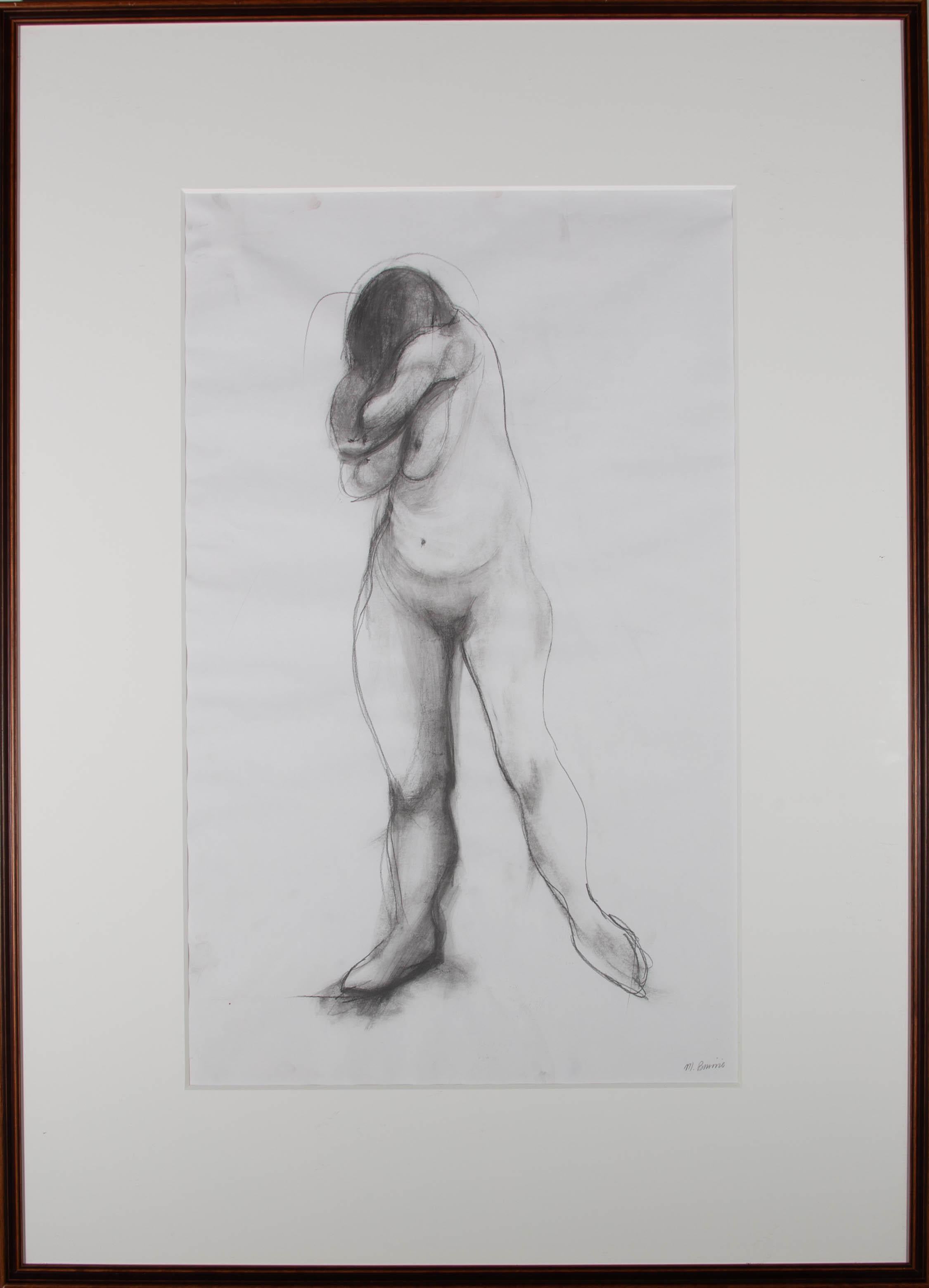 A striking nude study in graphite showing a woman with her head buried in her arms, hiding her face. The artist has signed to the lower right corner and the drawing has been presented in a simple wood frame with wide card mount. There is a label at