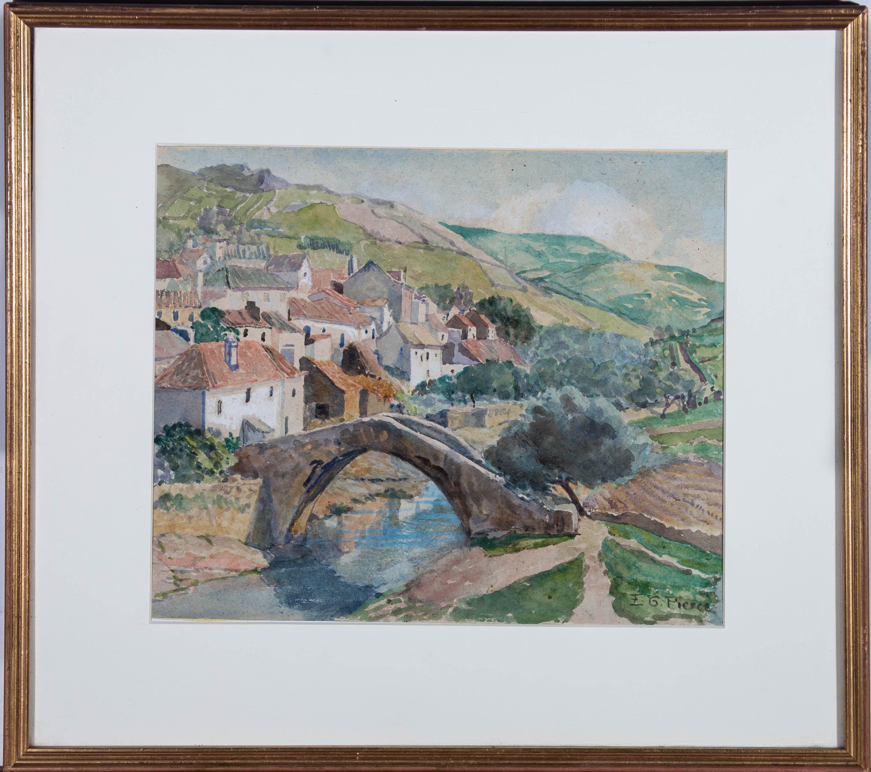 A wonderful study of an Italian or French village beside a river. Lush green hills surround the houses and a large stone bridge crosses the water. Very well presented in a cream card mount and gilt effect frame. Signed to the lower right. On