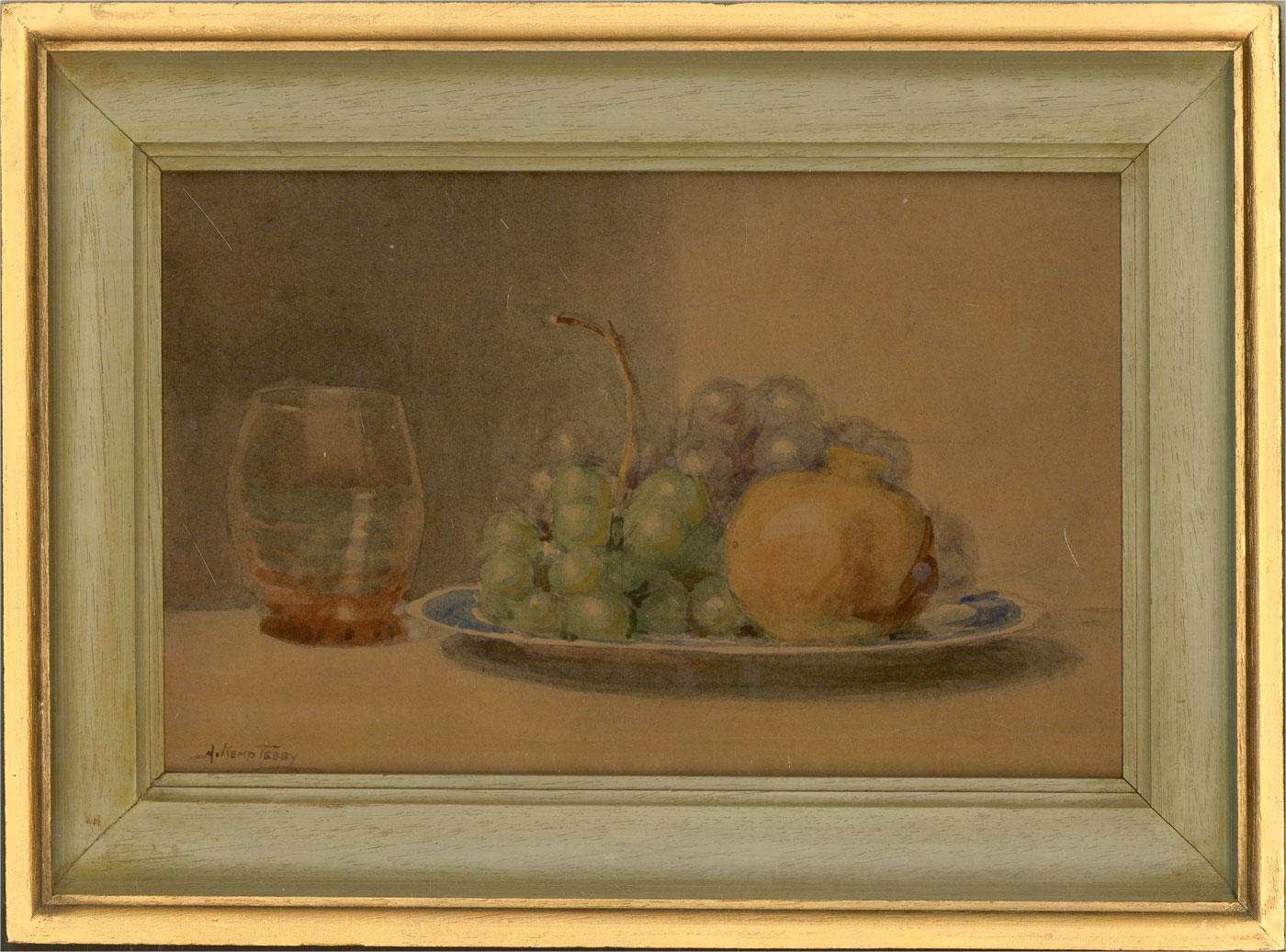 This delightful watercolour still life depicts a glass next to a plate of grapes with a ceramic vessel. Painted in a calming, subtle palette, the artist has has paid particular attention to portraying the soft lighting and the way it hits the