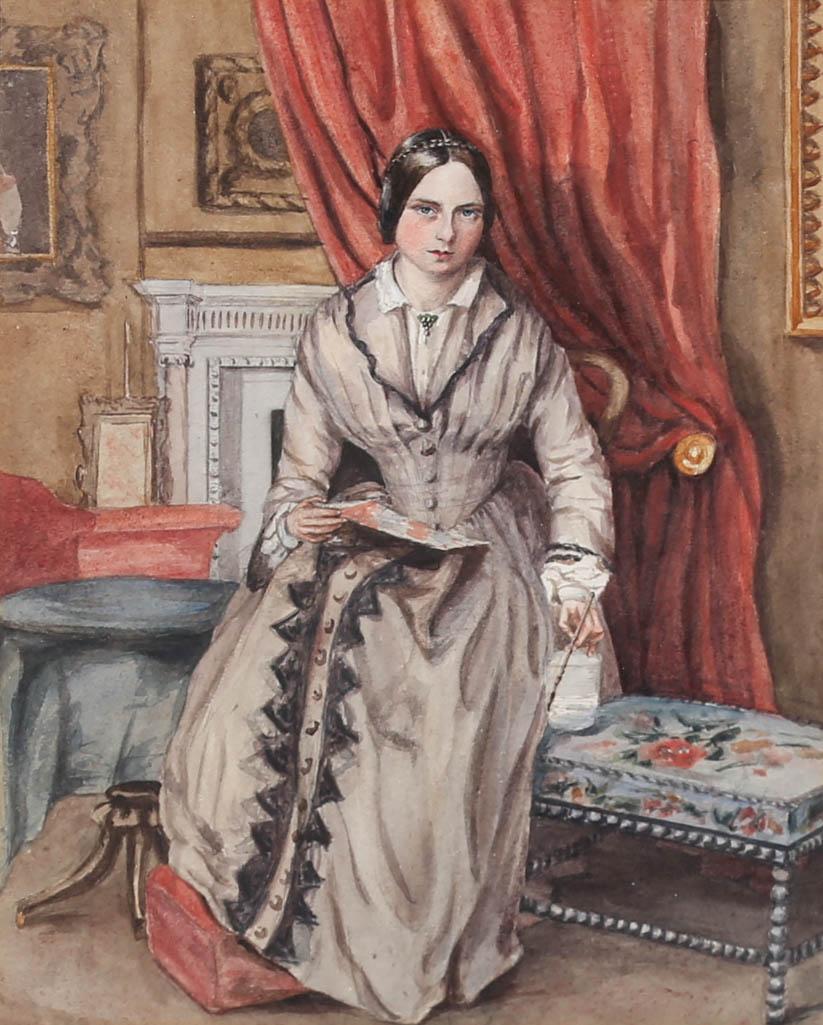 This finely painted watercolour portrait depicts the scene of a young Victoria women caught enjoying her recreational hobby of painting. The sitter is pictured poised in a luxurious living room interior with soft furnishings, and feet gentle perched