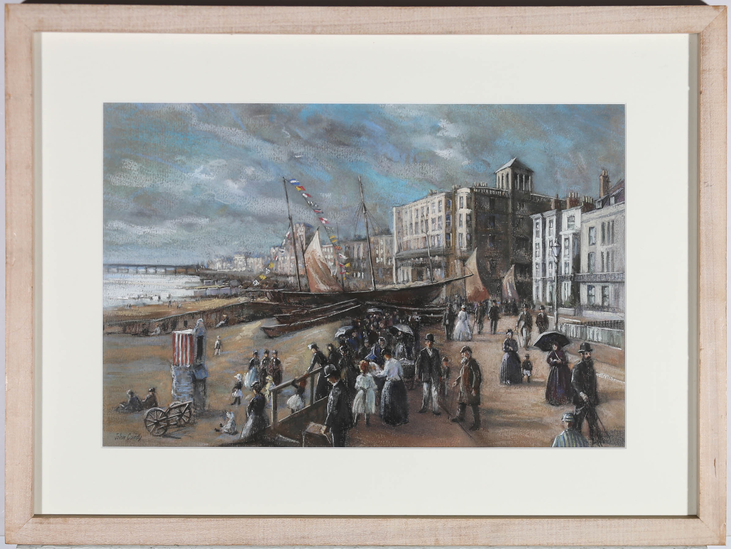 This very fine pastel study by John Cundy takes you back in time to a joyous scene from the Victorian period. Crowds of formally dressed beach goers can be seen in the centre of the composition gathering round the sandy amphitheatre, in anticipation