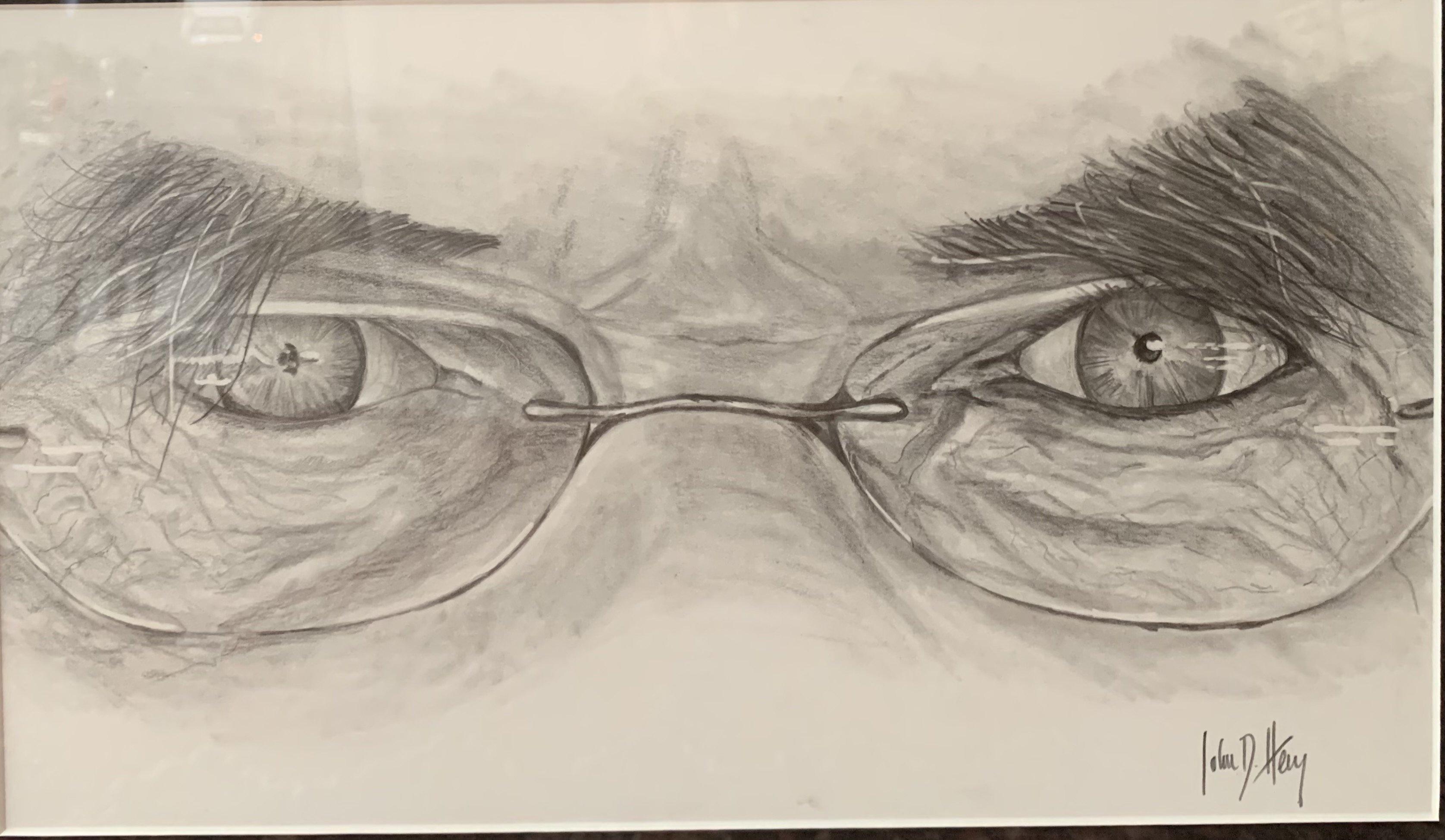 Porträt eines Mannes mit Augen. Eine Original-Skizze eines intensiven Blicks eines Herrn hinter einer Brille, signiert von dem Künstler John D. Hertz (Amerikaner, 1948). Der Künstler verwendet Kohle auf Papier, um seine Porträts zu zeichnen, die