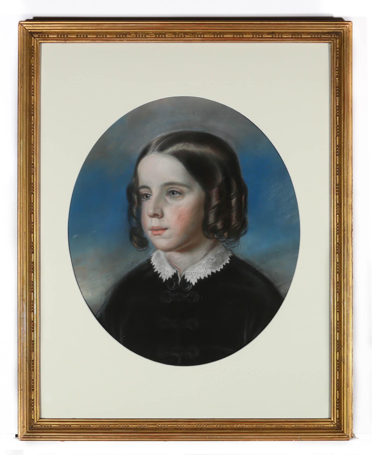 This fine Victorian portrait depicts a rosy cheeked and red lipped girl, sat wearing a black buttoned down frock with delicate lace collar. The artist has managed to capture the sitter's elegant ragged curls, shimmering on either side of her perfect