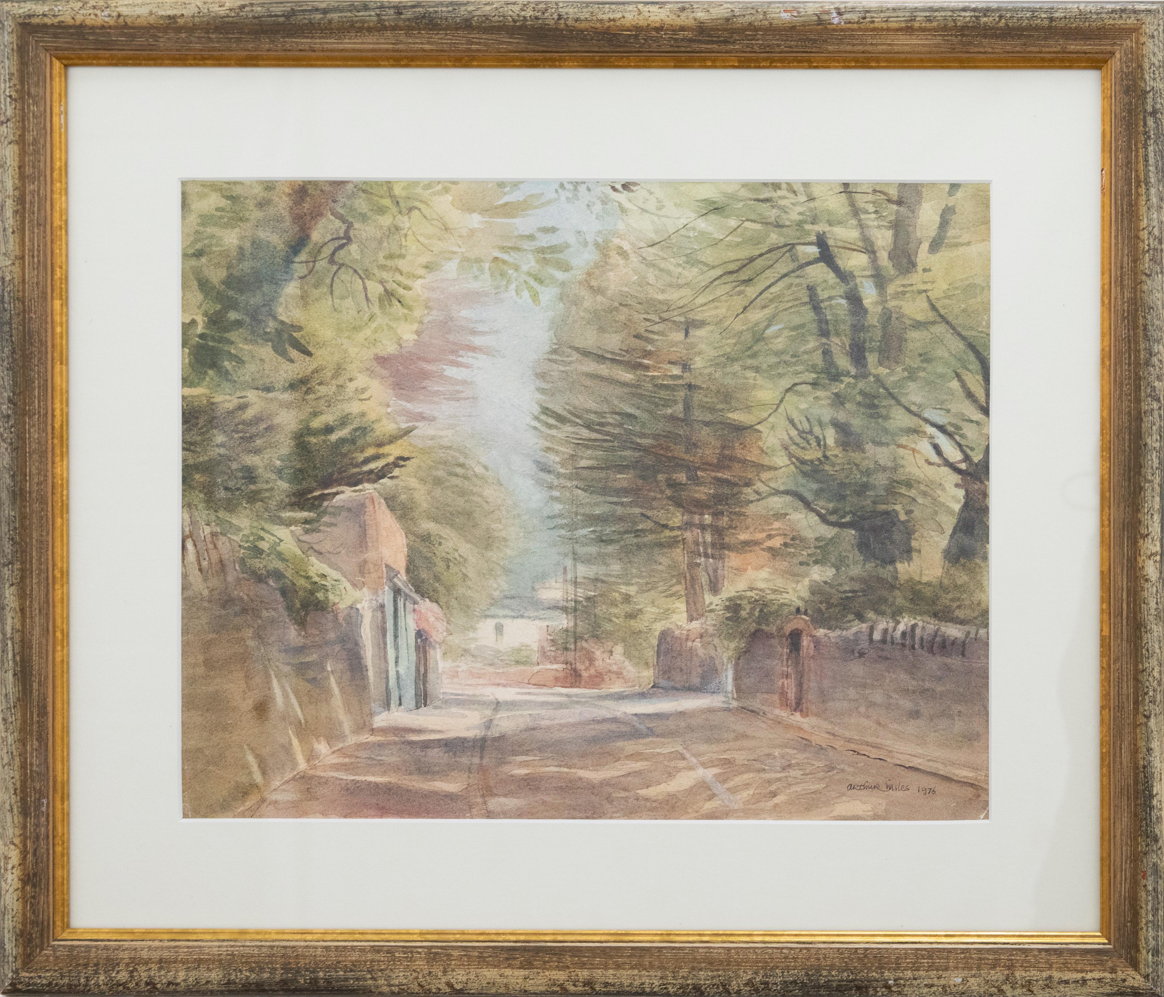 A charming watercolour study of a quiet roadway through a village, with stone walls and trees on either side. Signed and dated to the lower right. Well-presented in a contemporary frame with a new card mount. On paper. 