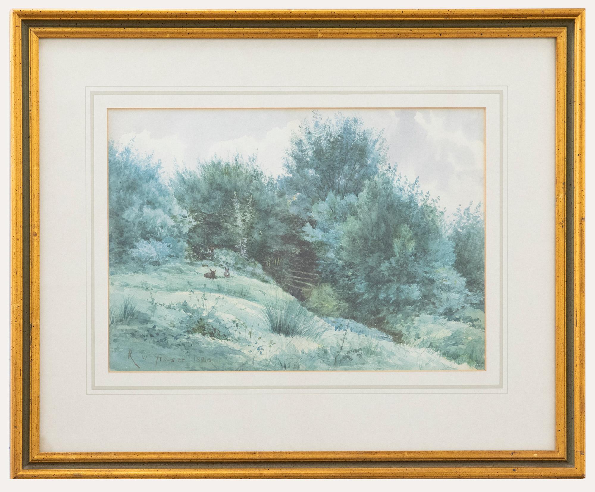 A delightful watercolour painting by the artist Robert Winchester Fraser (1848-1906), depicting wild rabbits grazing a sunny hillside. The watercolour has been signed and dated to the lower left. Presented in an attractive gilt frame with a classic