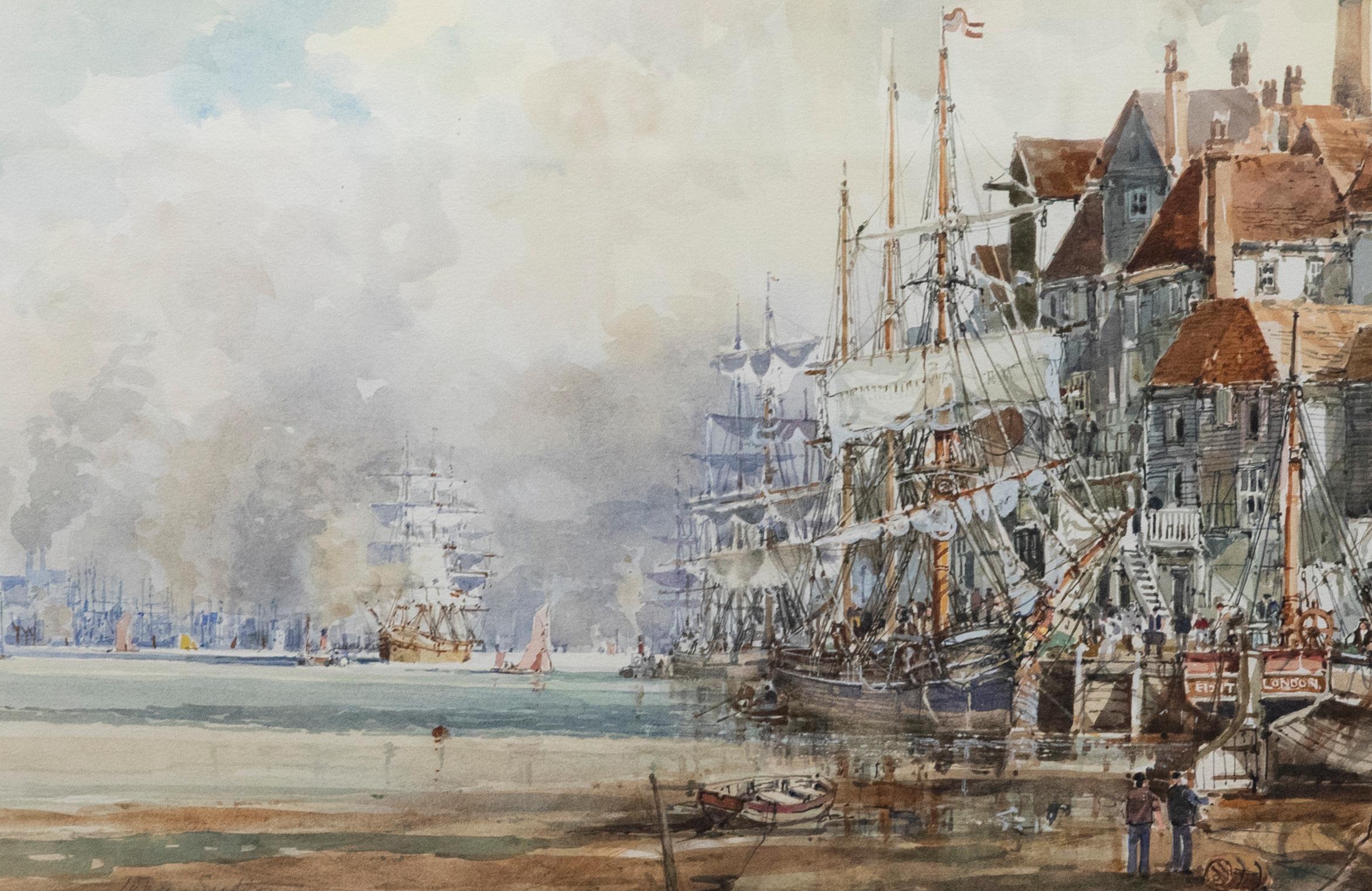 A dramatic and busy shipping port scene by the British marine and landscape artist John Sutton. Signed in pencil to the lower left edge. Well-presented in a fine gilt-effect frame with a crisp white mount. On watercolour paper.

