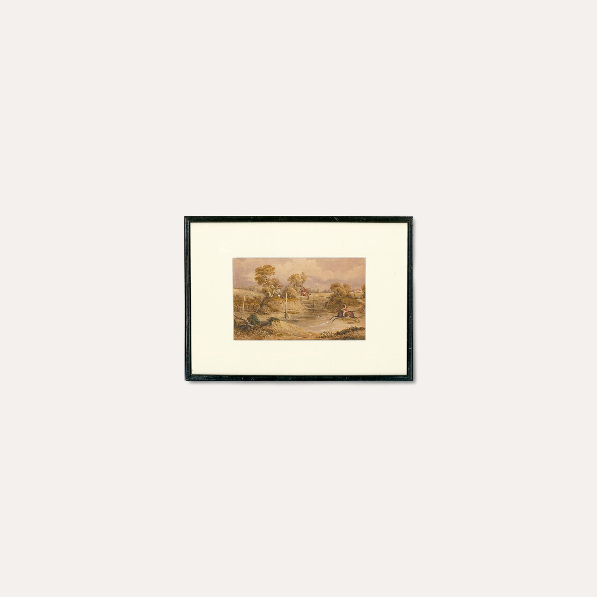 A fine watercolour study of huntsmen and hounds in a landscape. The horses jump and gallop through a shallow river following a large pack of dogs in a distant field. The artist the intricate details of the landscape and figures with an expert hand