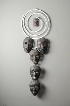 The five masks, Elisia Nghidishange, mixed media, paper, plaster, wire