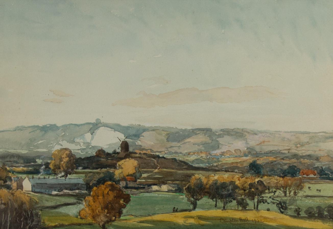 A fine original 1922 watercolour by the British artist Joseph Compton Hall RBA (1863-1937), depicting a rural countryside view of the North Downs near Reigate, Surrey, England. The artist has achieved a great sense of compositional balance, with