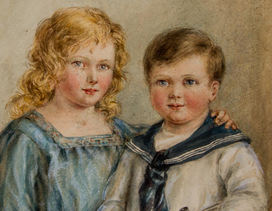 A very fine early 20th century watercolour study of two young children. Both are handsomely dressed in their Sunday best, the young girl in a pretty blue dress and her brother in a sailor suit. The artist has wonderfully captured the pair holding