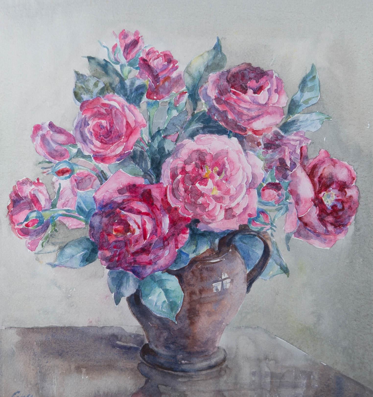 A charming watercolour painting, depicting a still life of roses in a jug. Signed to the lower left-hand corner. Well-presented in a wash line card mount and in a speckled frame with gilt details. On watercolour paper.
