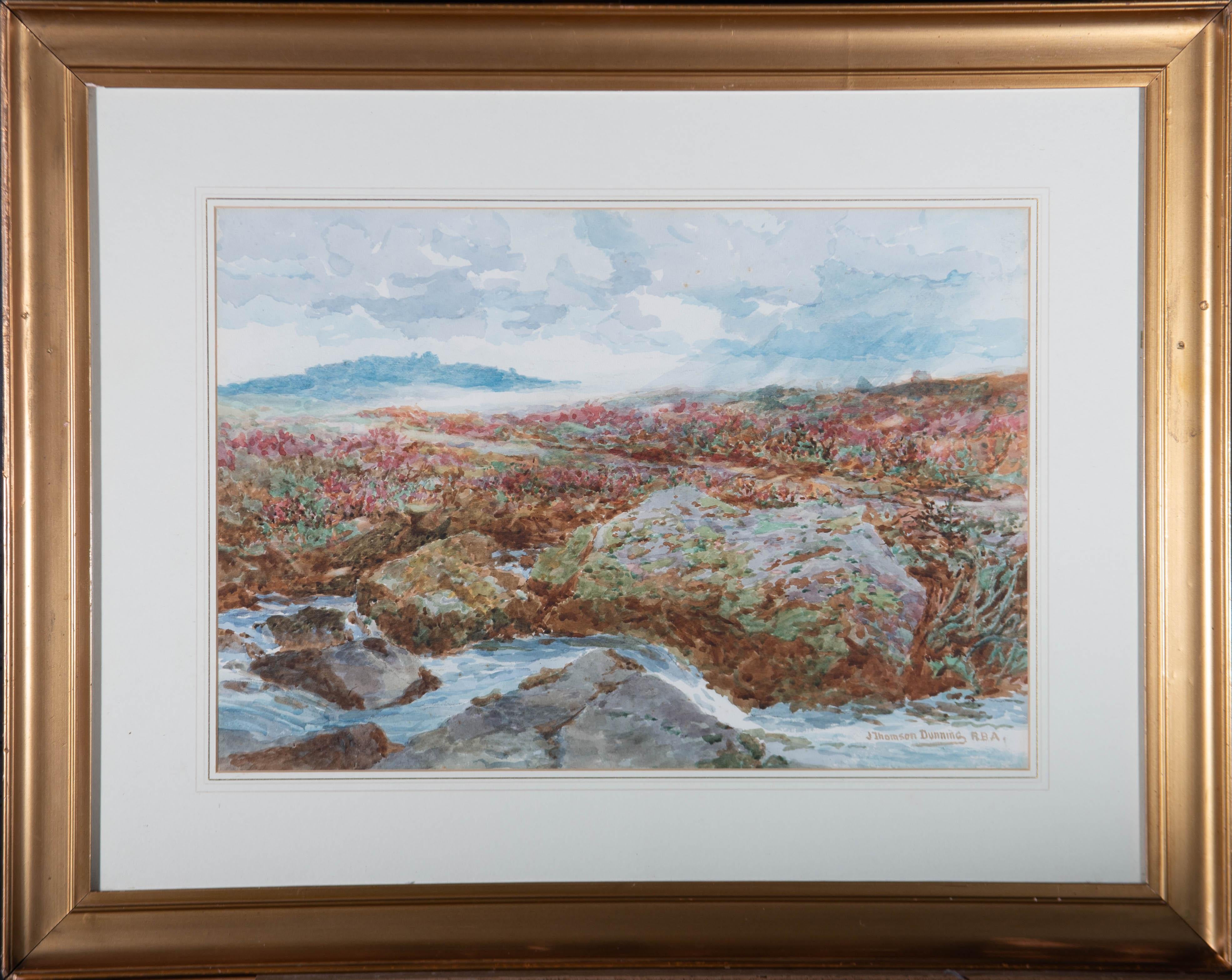 An accomplished landscape at Wedlake Tor on Peter Tavy Common in Dartmoor. Presented glazed in a wash line mount with gold detailing and a distressed gilt-effect wooden frame. Signed to the lower-right edge. There is a faded original label on the