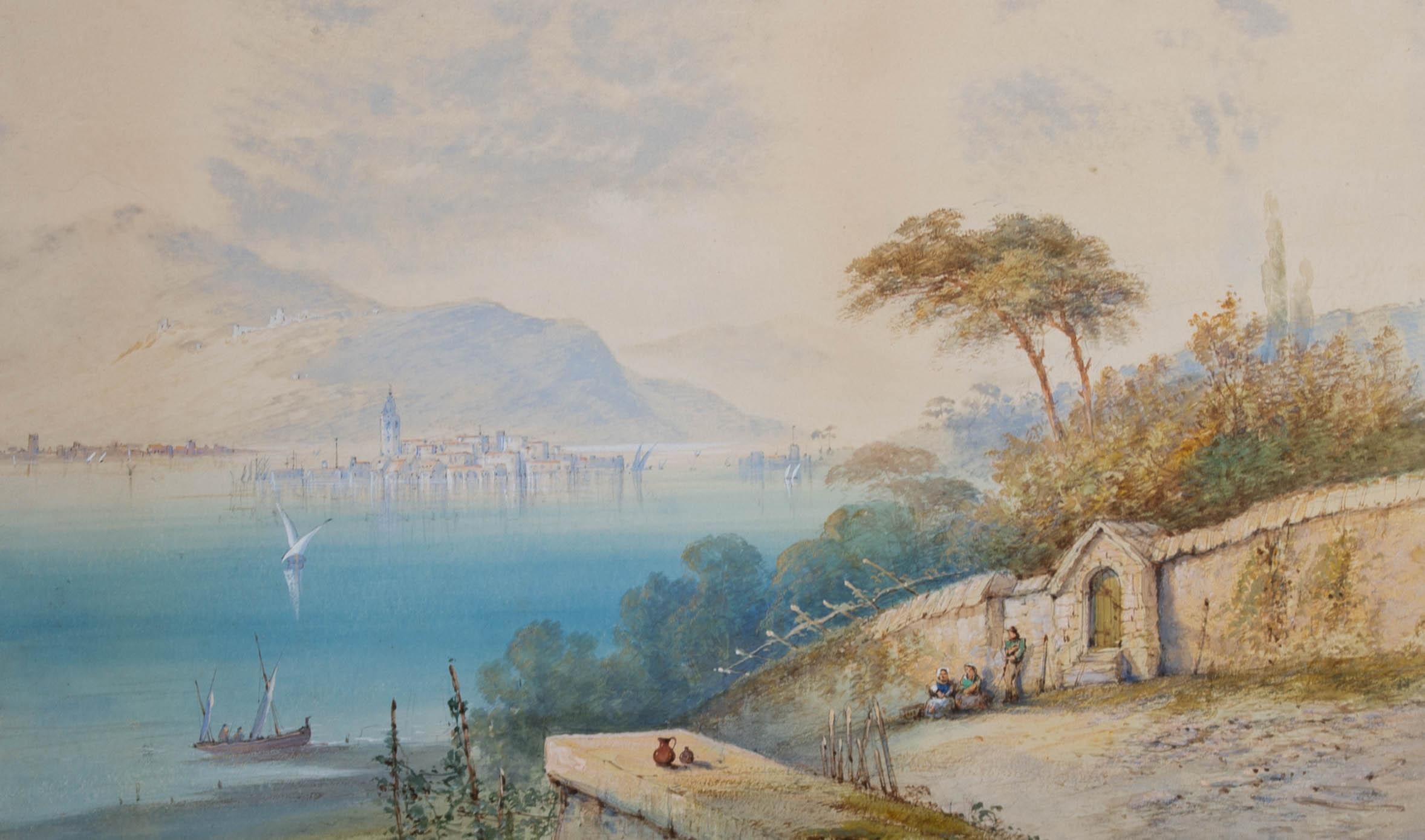 An elevated view across an Italian lake. Presented unglazed in a white mount with gold detailing and a distressed gilt-effect wooden frame. Signed and dated to the lower-right edge. On watercolour paper.
