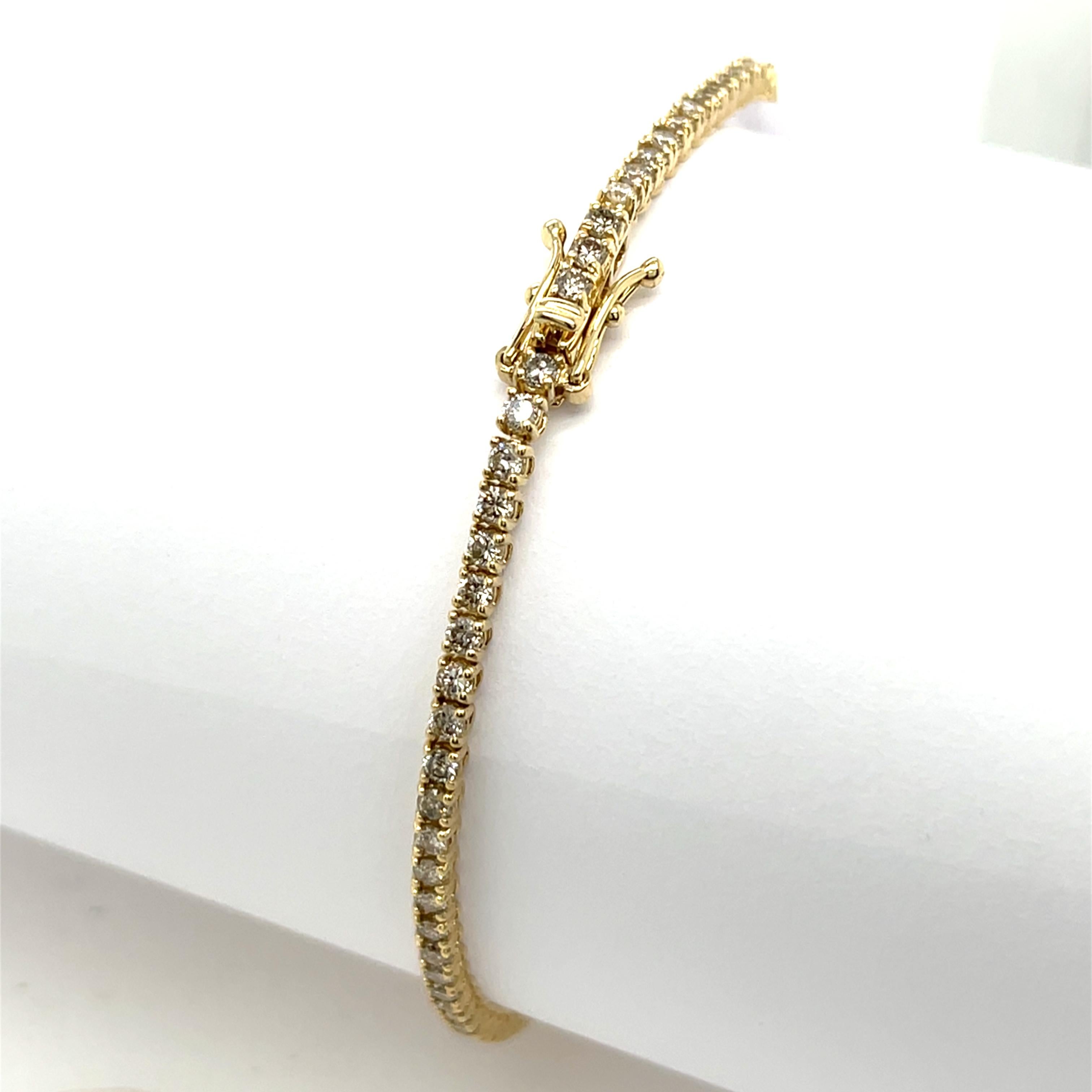 Taglio rotondo Bracciale tennis con diamanti da 2,25 carati in oro giallo 14 carati in vendita