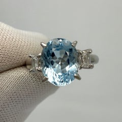 2.25ct Oval Cut Aquamarine And Emerald Cut Diamond Platinum Three Stone Ring