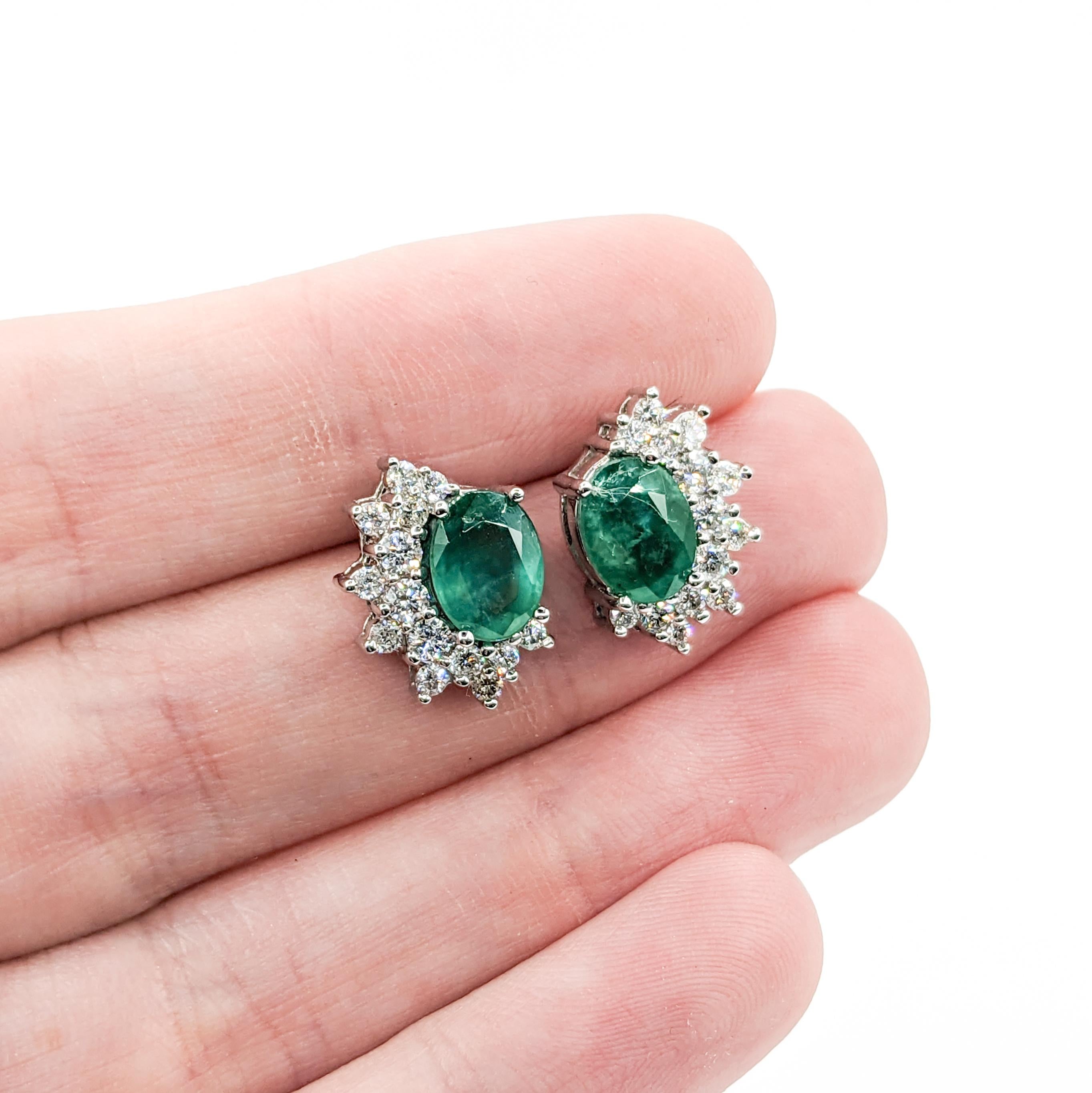 2.25ctw Emerald & Diamond Earrings In White Gold

Indulge in the radiance of these stunning earrings, exquisitely crafted from 14kt White Gold. They boast .52ctw of shimmering round diamonds with SI2 clarity and H-I color, enhancing their sparkle.