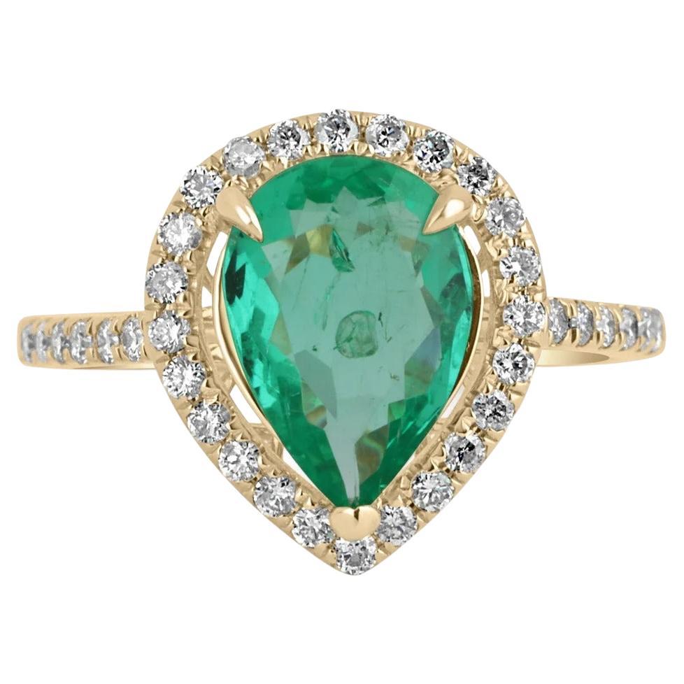 Anillo de compromiso de oro con halo de diamantes y esmeraldas colombianas talla pera de 2,25 qt 14k