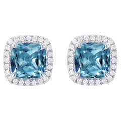 Clous d'oreilles en or 18 carats avec topaze bleue de Londres de 2,26 carats et diamant blanc.