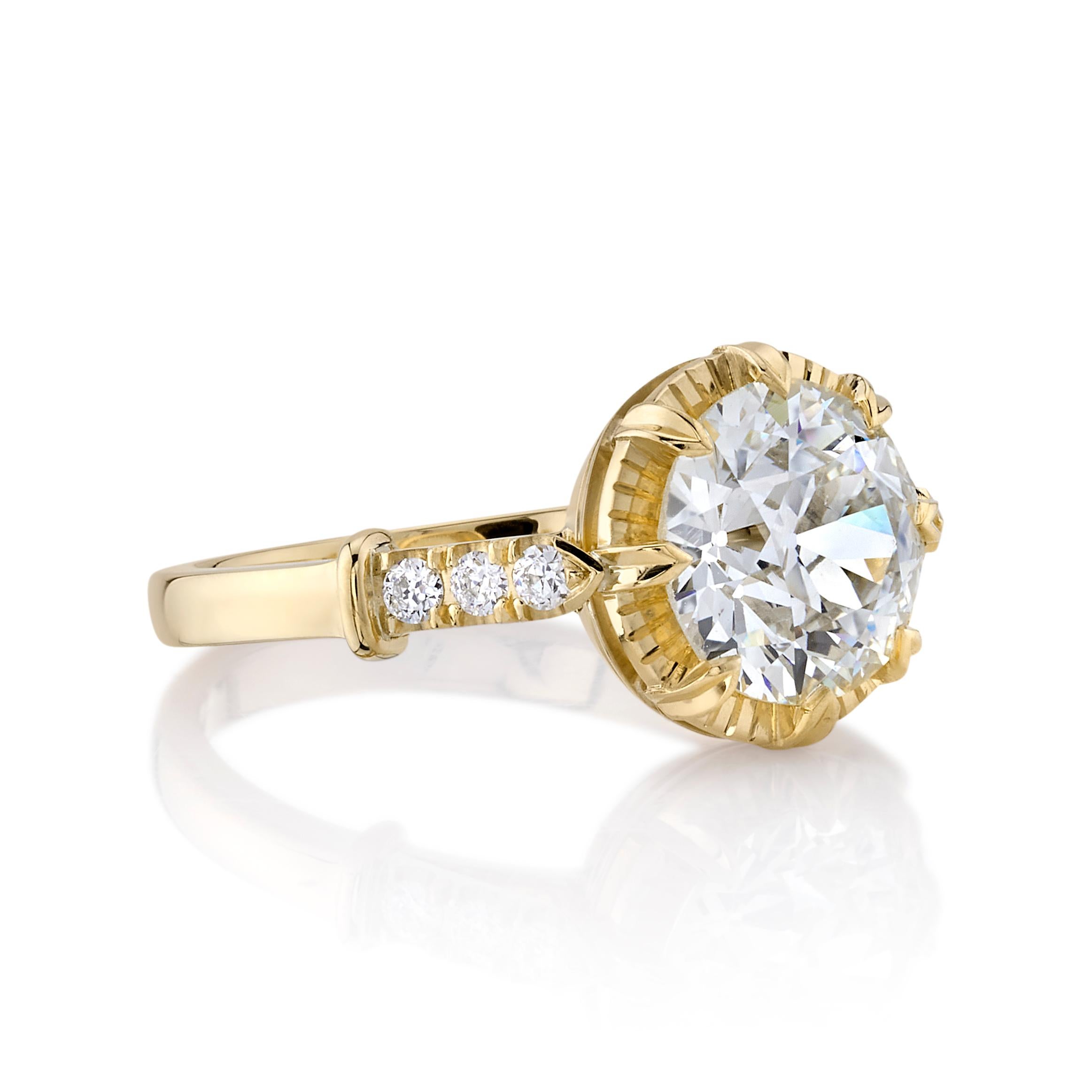 2.26ctw M/VS2 GIA certified old European cut diamond with 0.11ctw old European cut accent diamonds set in a handcrafted 18K yellow gold mounting.

Ring is currently a size 6 and can be sized to fit.