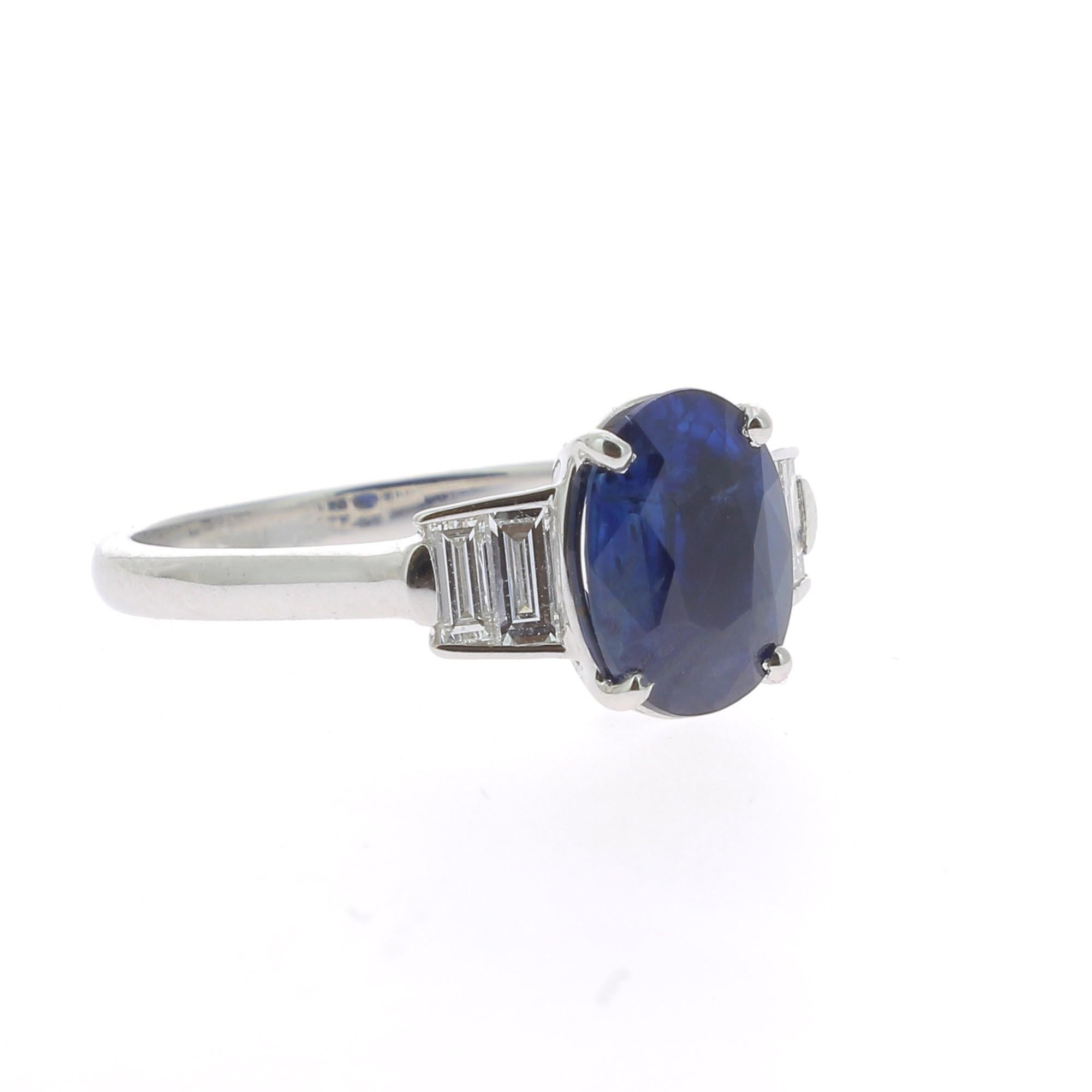 Oval Cut 2.26 Carat Oval Intense Blue Sapphire Cocktail Ring Set Baguette White Diamond
