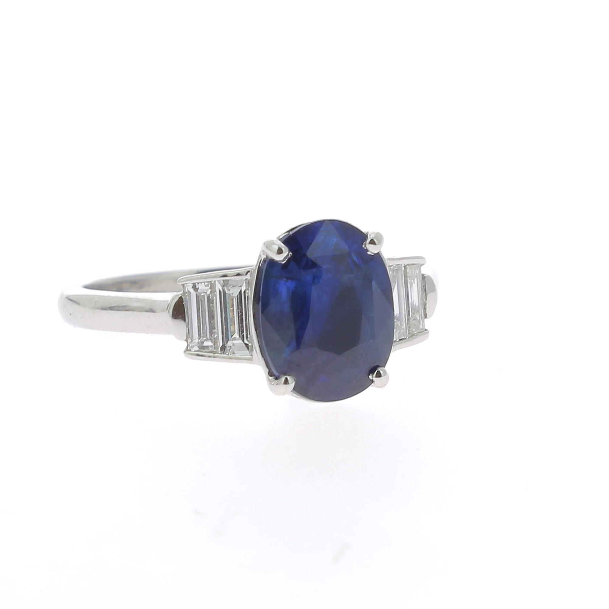 2.26 Carat Oval Intense Blue Sapphire Cocktail Ring Set Baguette White Diamond In New Condition In Istanbul, TR