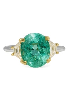 2.26 carat Paraiba Tourmaline Three Stones Ring