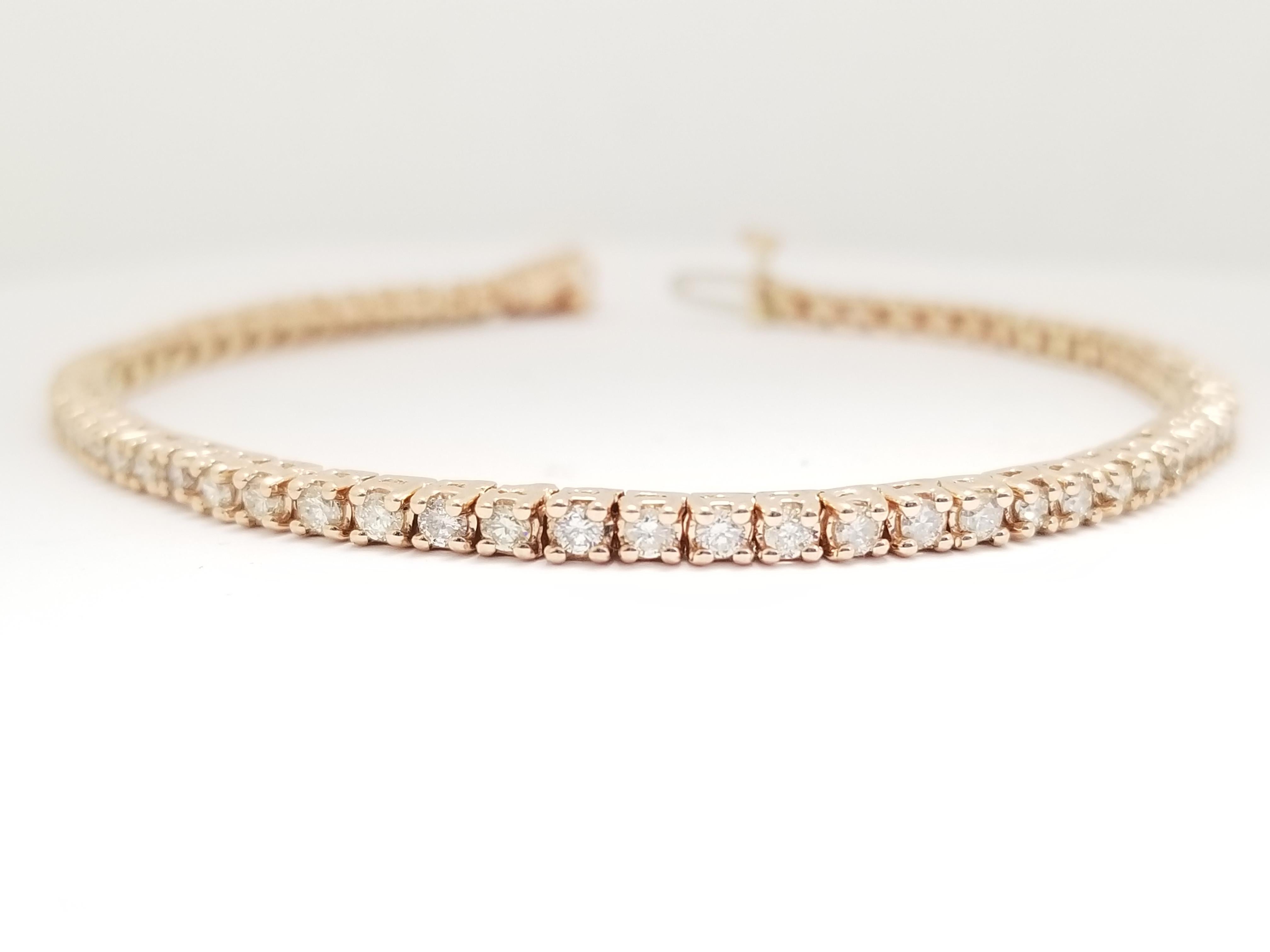 Beautiful natural diamond tennis bracelet, round-brilliant cut white diamonds clean and Excellent shine. 14k rose gold classic four-prong style for maximum light brilliance. Ordinary style. Extraordinary elegance.

7 inch length. 
2.5 mm wide.