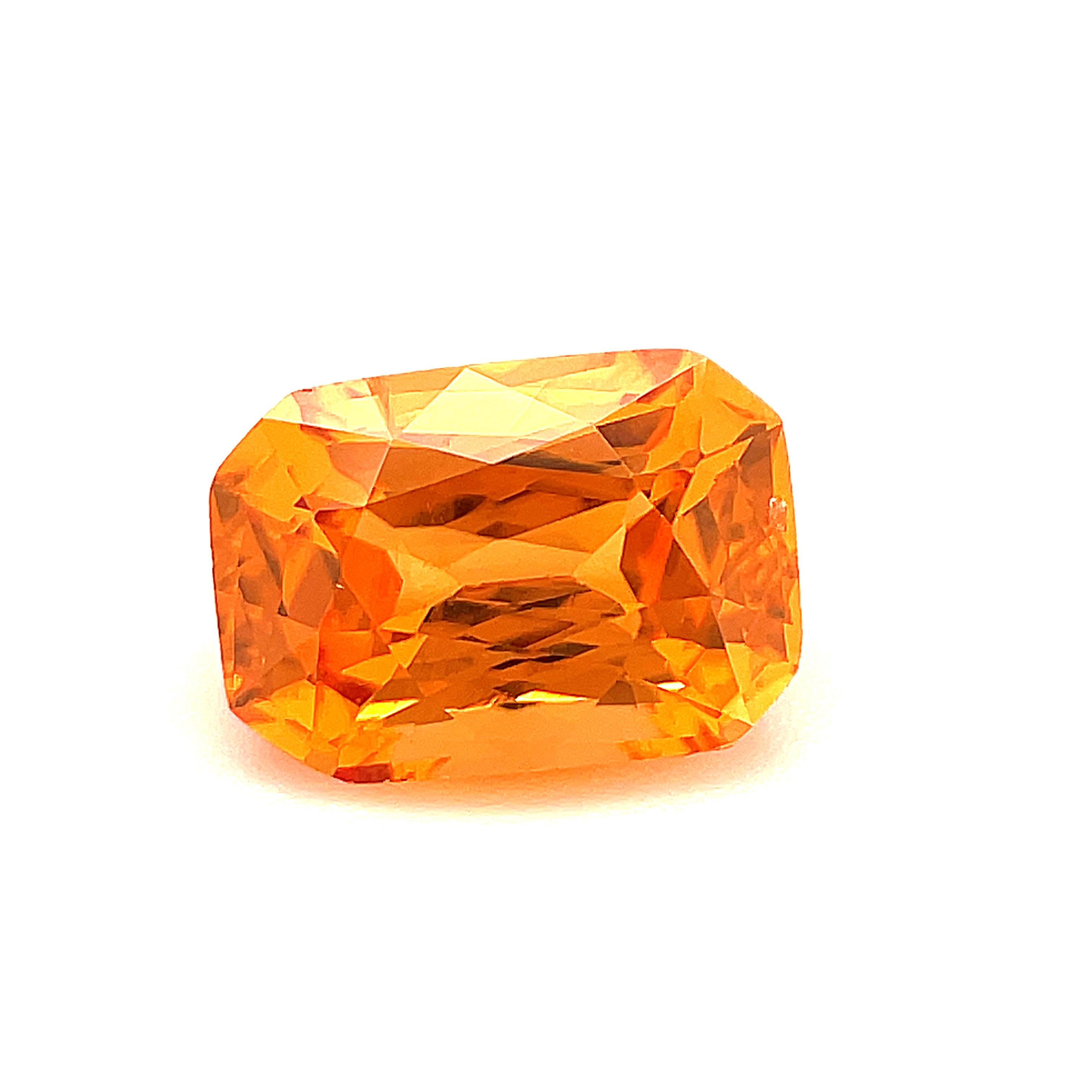 This lively orange spessartite garnet has beautiful color! The unusual modified brilliant facets and exceptional luster allow for superior light return and vibrance. This gem has a vivid, warm orange color, the color of a Mandarin orange or 