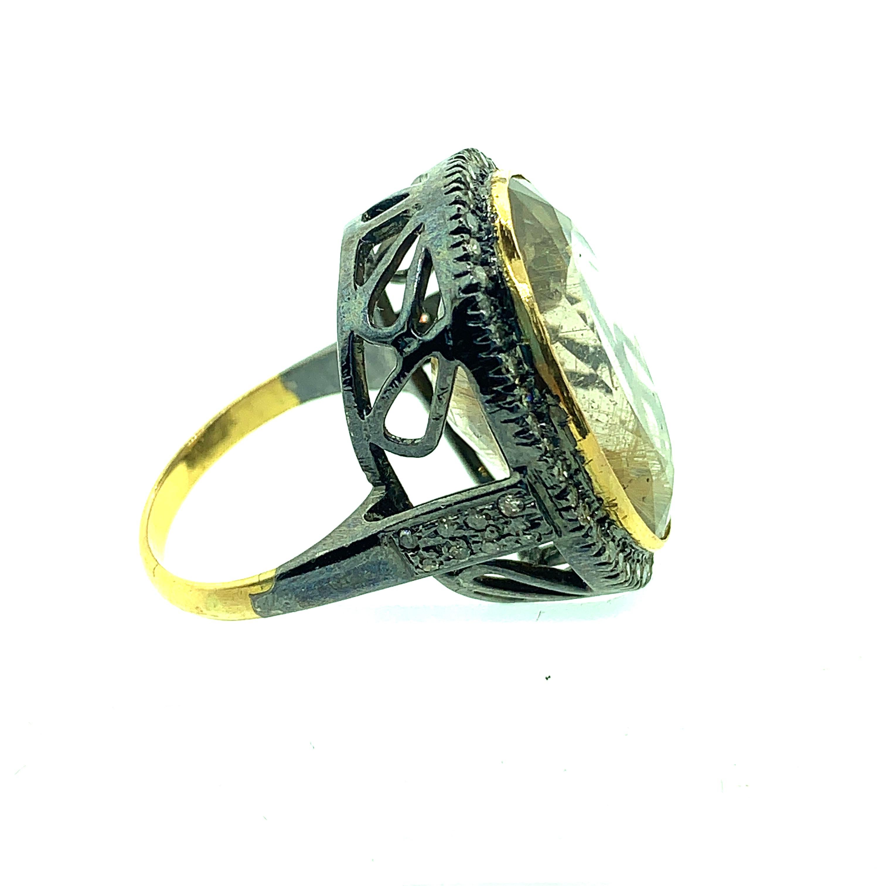 Oval Cut 22.60 Carat Rutilated Quartz 0.70 Carat Diamonds Silver 14 Karat Gold Ring For Sale