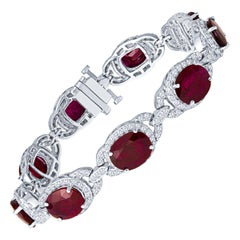 Rubí ovalado de 22,63 ct y diamante redondo de 3,44 quilates Pulsera de eslabones de oro de 14 quilates