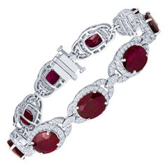 Bracelet à maillons en or 14 carats avec rubis de forme ovale 22,63 carats et diamants ronds de 3,44 carats