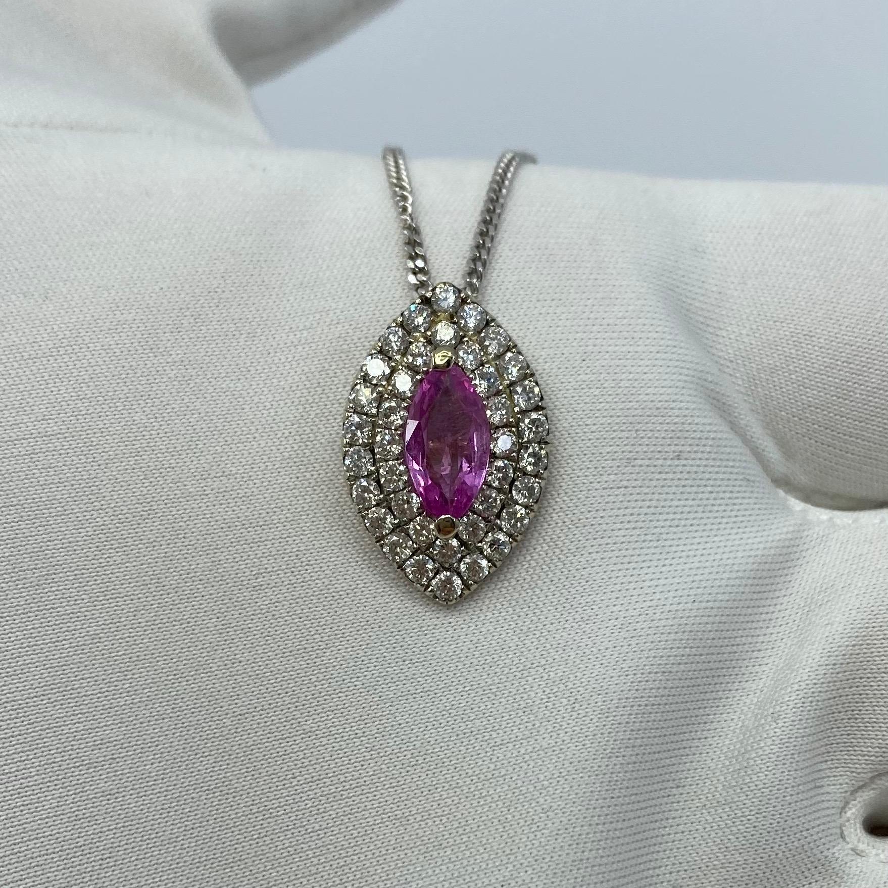 Fine Vivid Pink Sapphire And Diamond 18k White Gold Pendant Necklace.

1.20 Carat vivid pink centre sapphire with an excellent marquise/navette cut and excellent clarity, very clean gem with only some small natural inclusions visible when looking