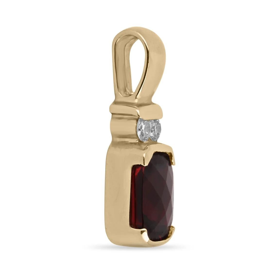 A stunning natural garnet & diamond accent pendant. This lovely piece features a natural 2.20-carat, radiant emerald-cut garnet with excellent qualities. Half bezel set, with two brilliant round, cut diamonds at the top accenting it. Crafted in