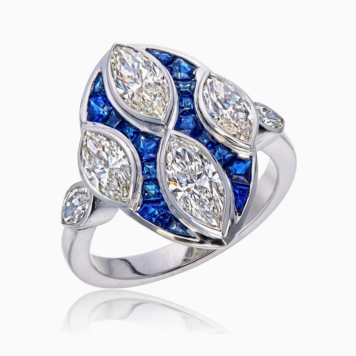 An elegant ring showcased by Rewa jewels is hancrafted in 18 karat white gold.

Studded with six pieces diamonds of marquis shaped weighing approximately 2.27 carat complimenting the ring. They are approximately G-I colour and VS-SI quality.

They