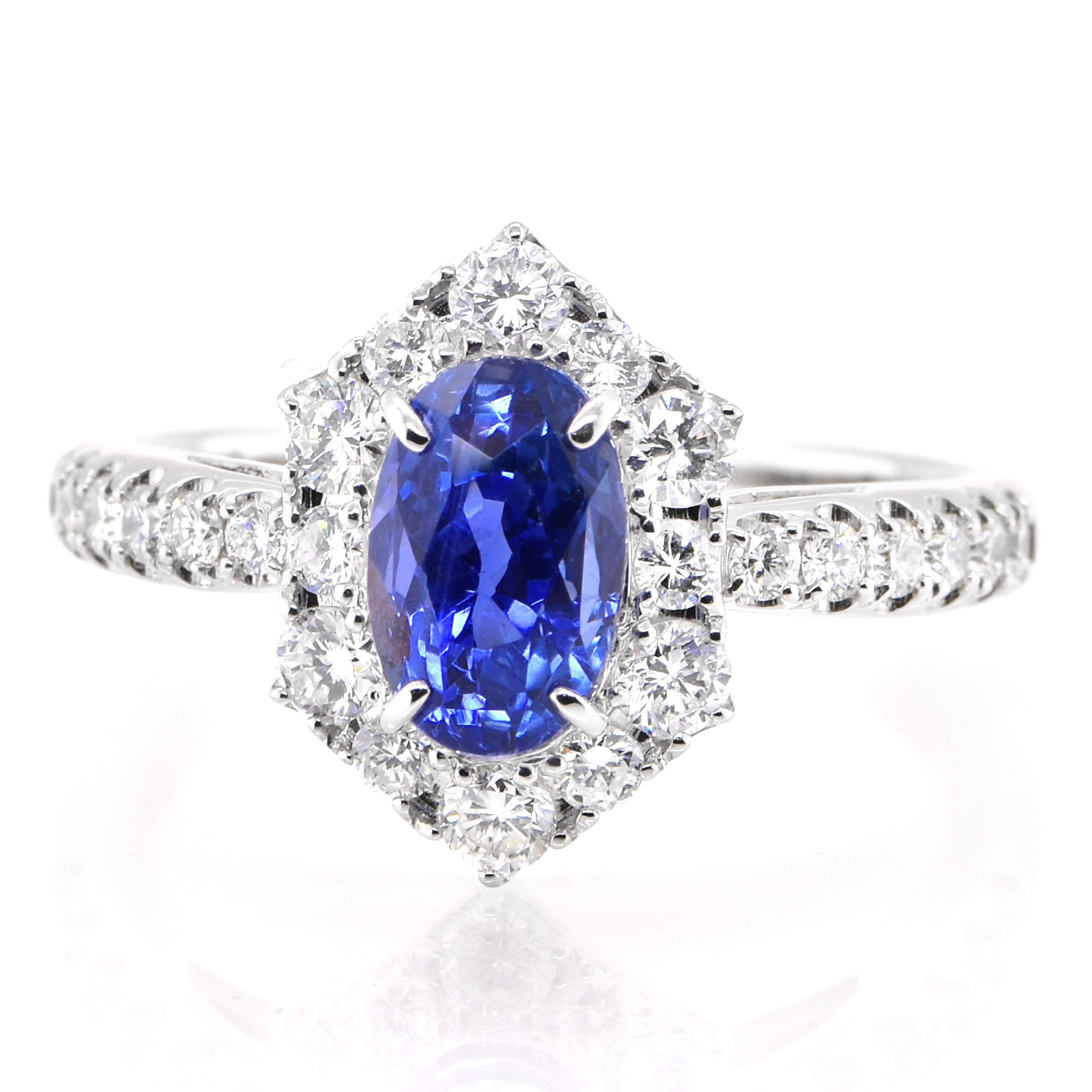 A beautiful ring featuring 2.273 Carat Natural Blue Sapphire and 0.70 Carats Diamond Accents set in Platinum. Sapphires have extraordinary durability - they excel in hardness as well as toughness and durability making them very popular in jewelry.